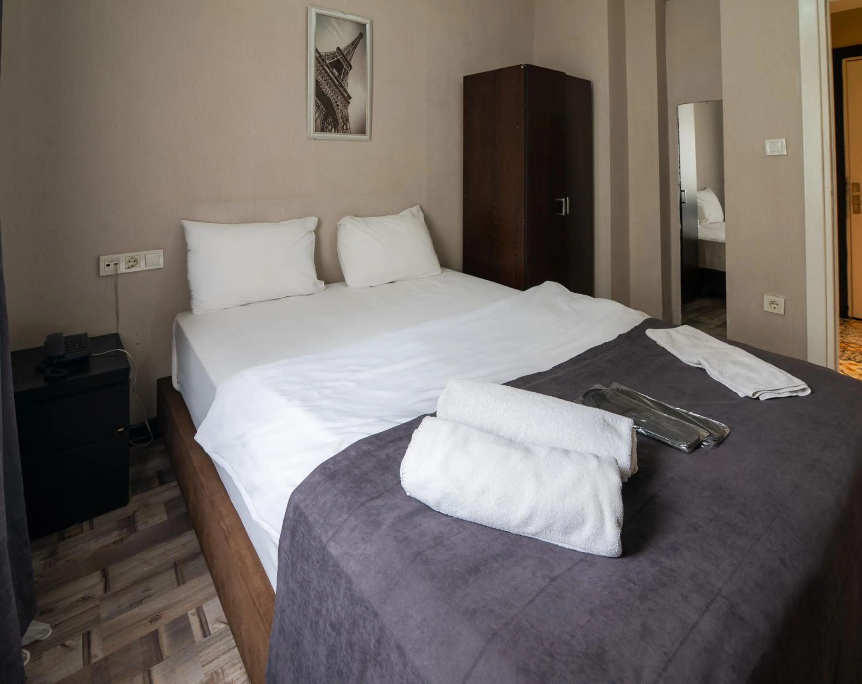 Bed in İmza Hotel Suite