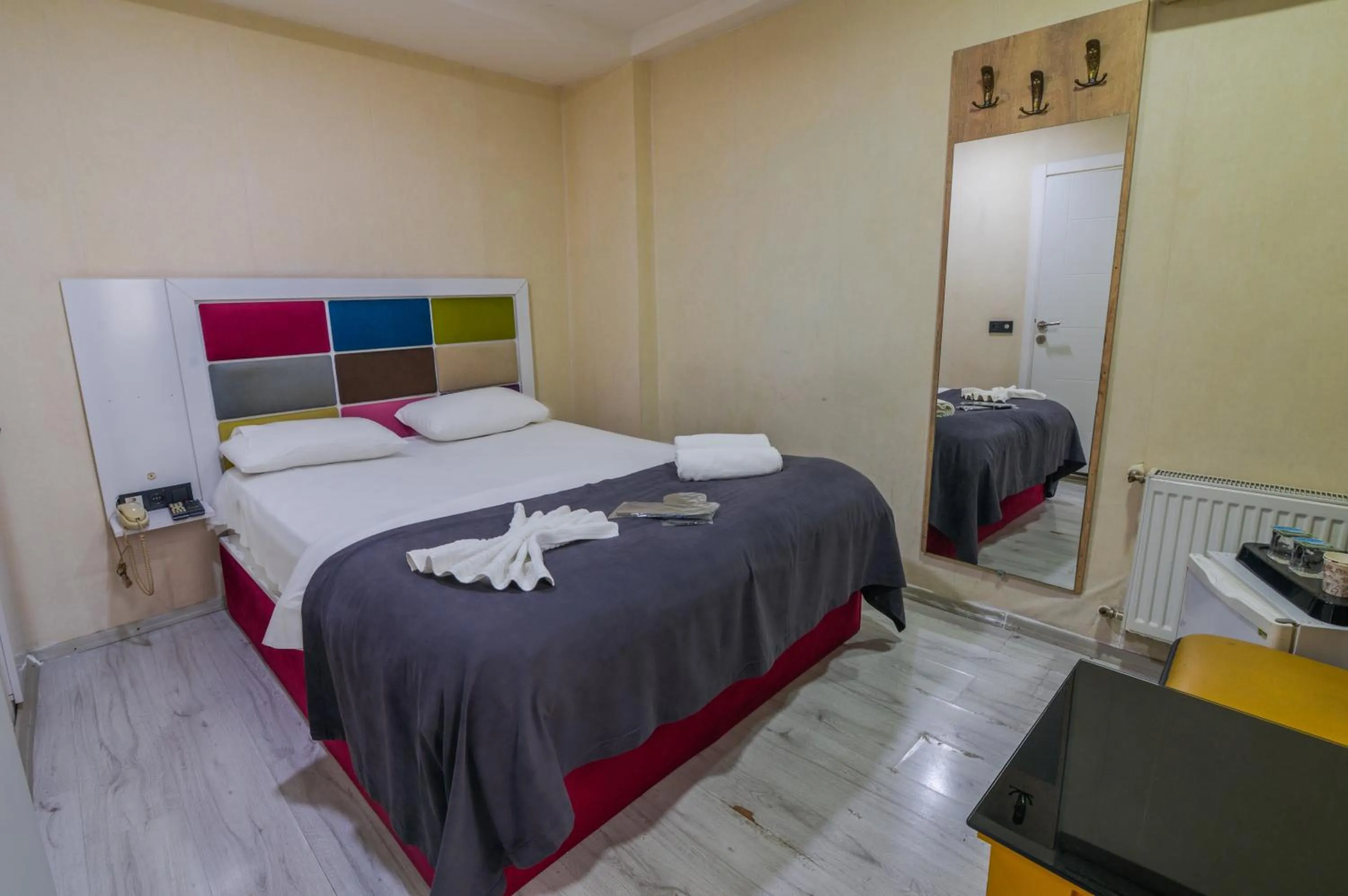 Bed in İmza Hotel Suite