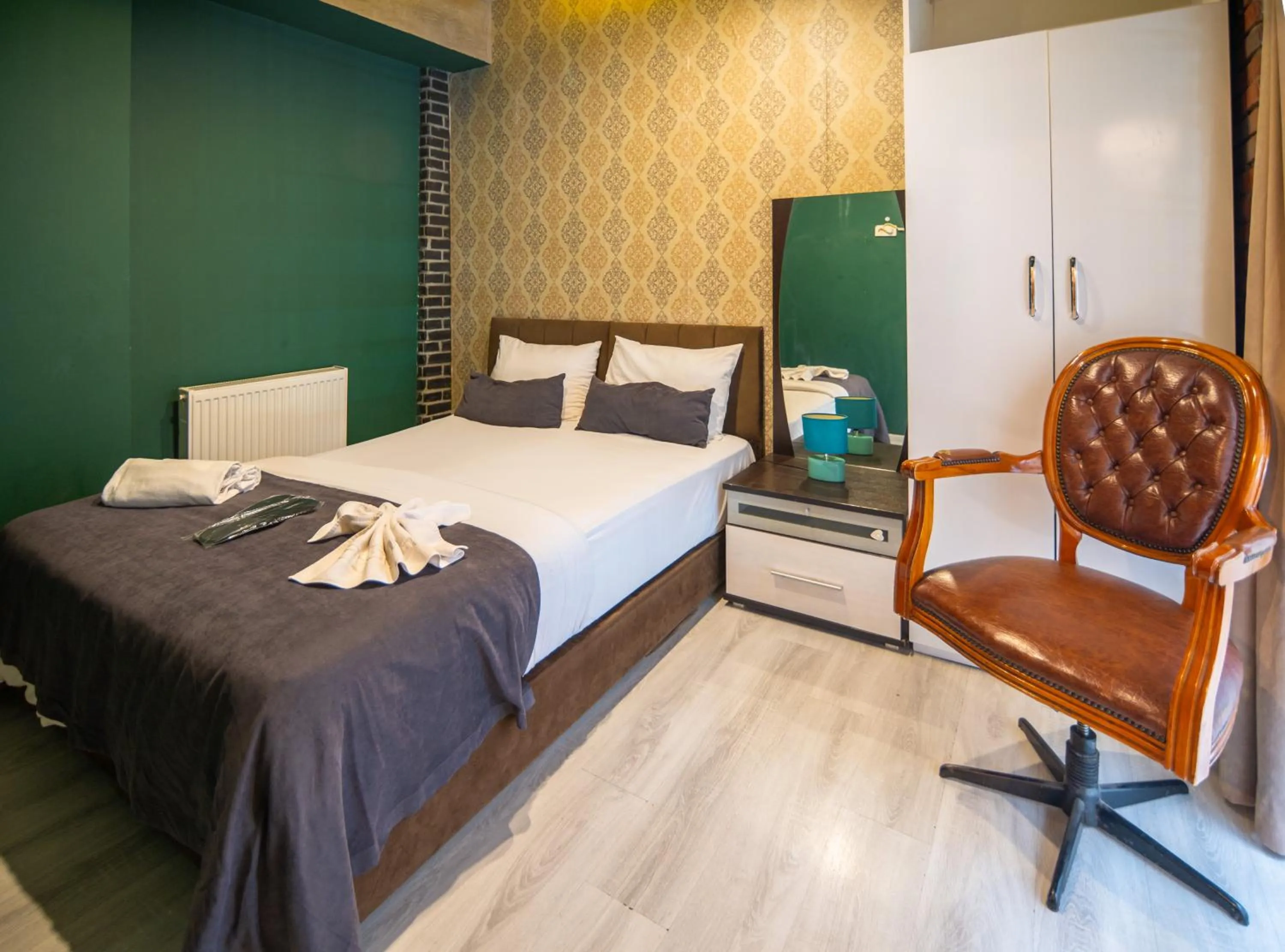 Bed in İmza Hotel Suite