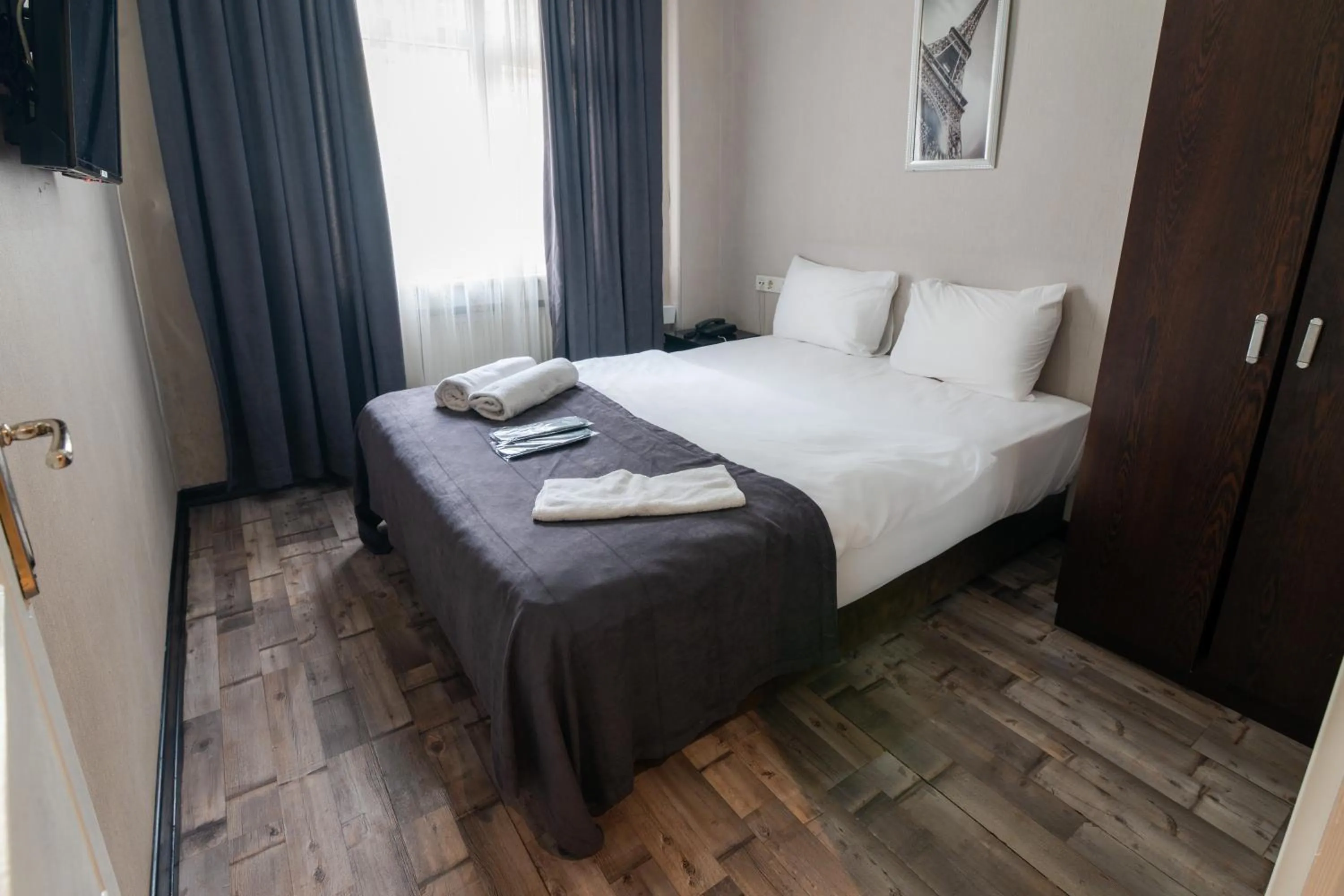 Bed in İmza Hotel Suite