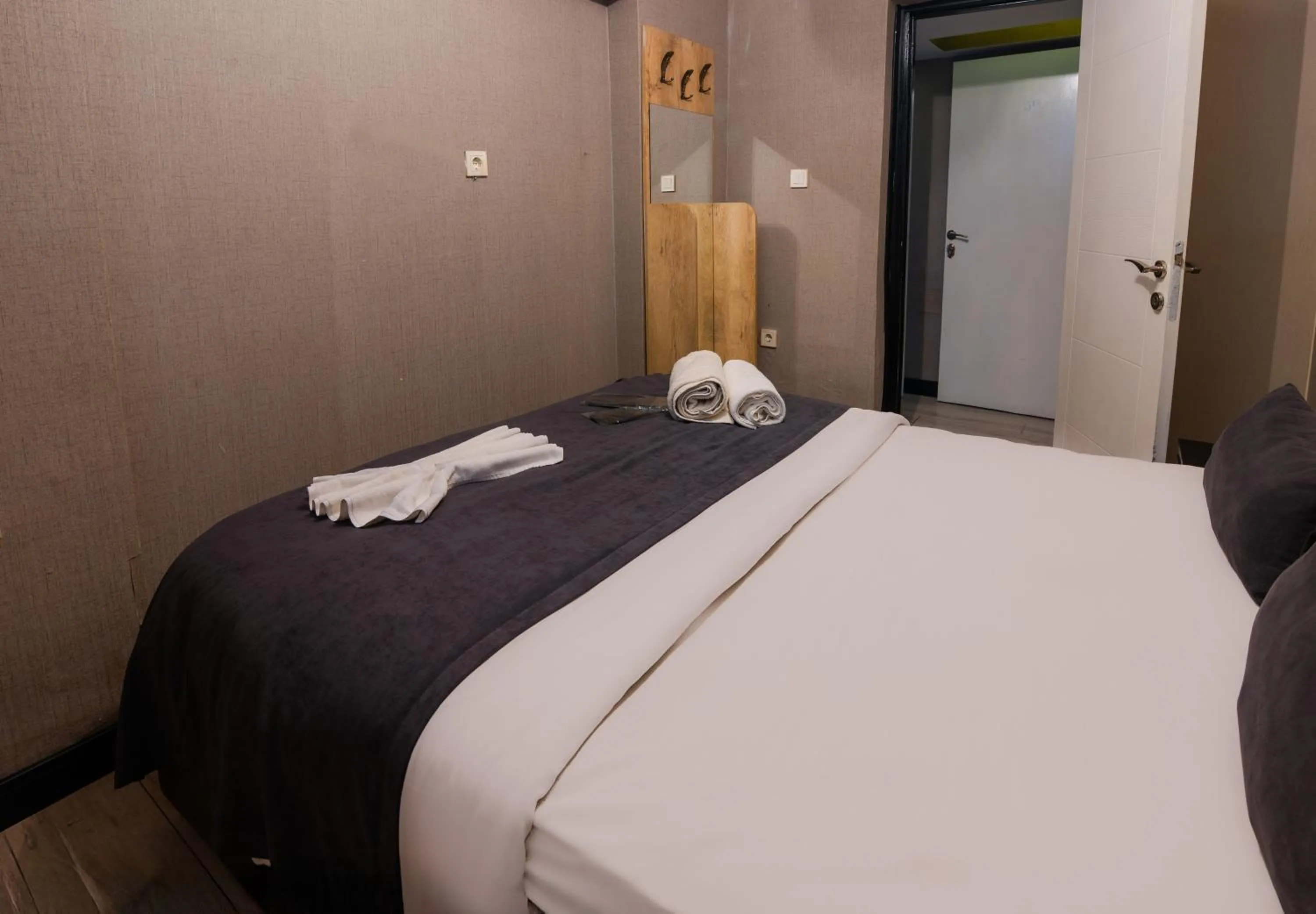 Bed in İmza Hotel Suite