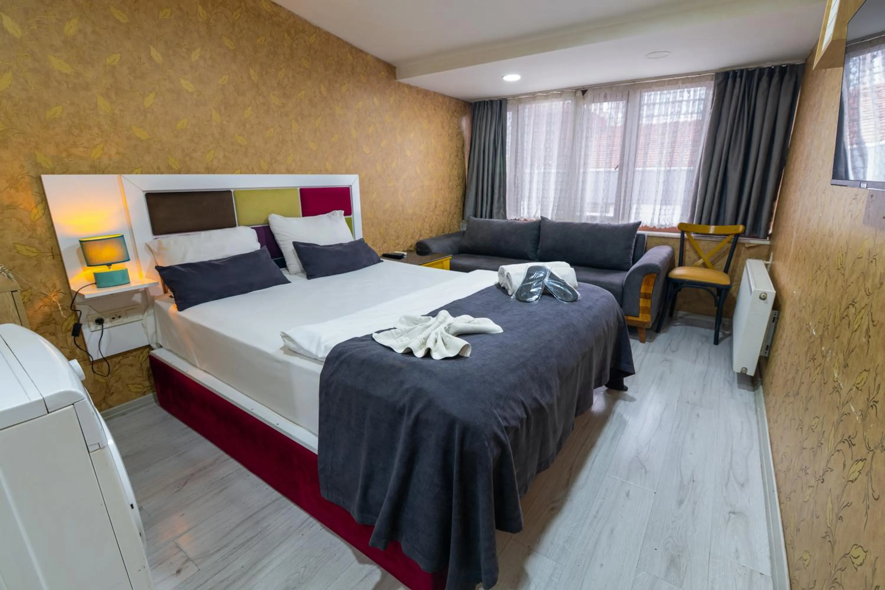 Bed in İmza Hotel Suite