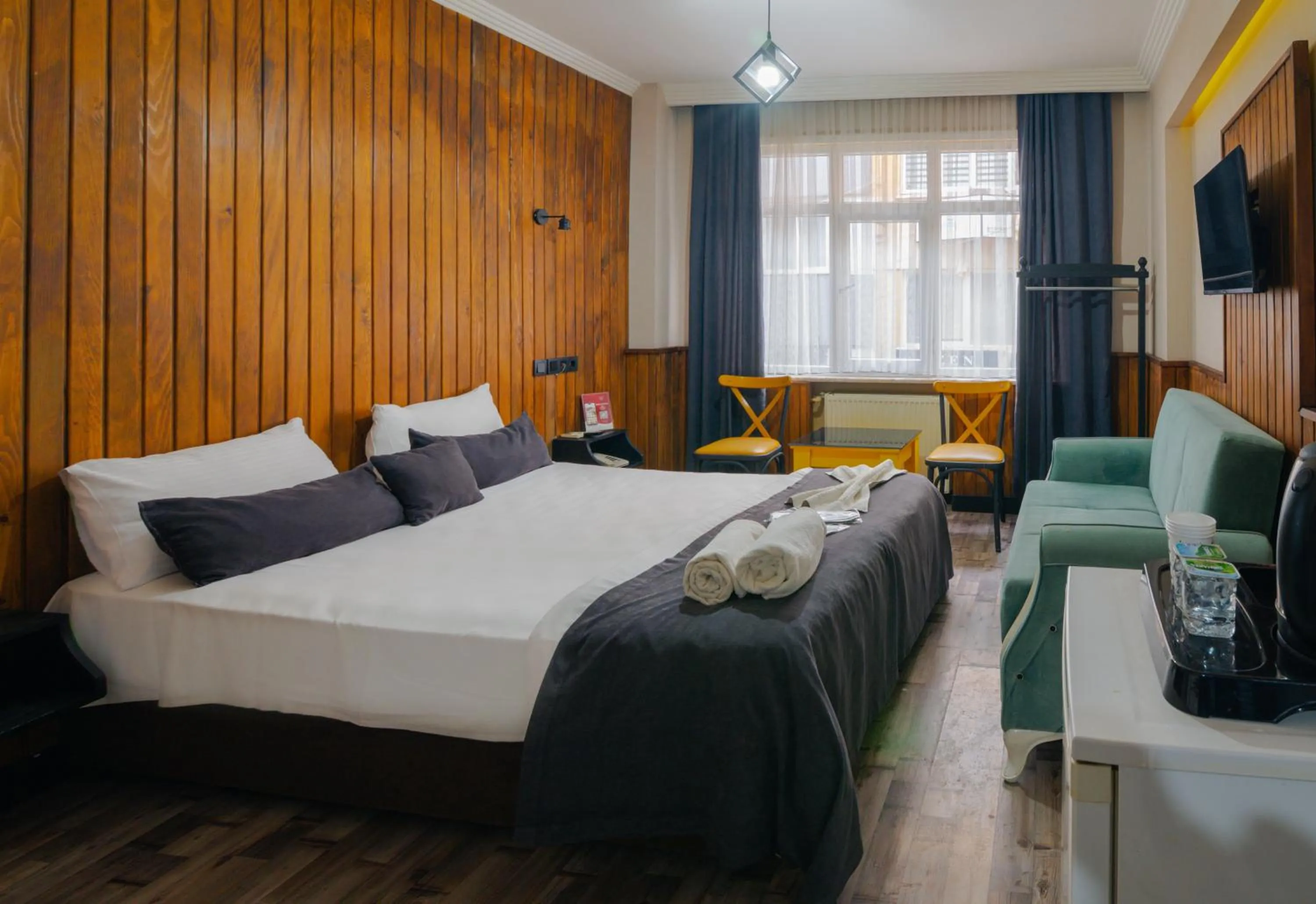 Bed in İmza Hotel Suite