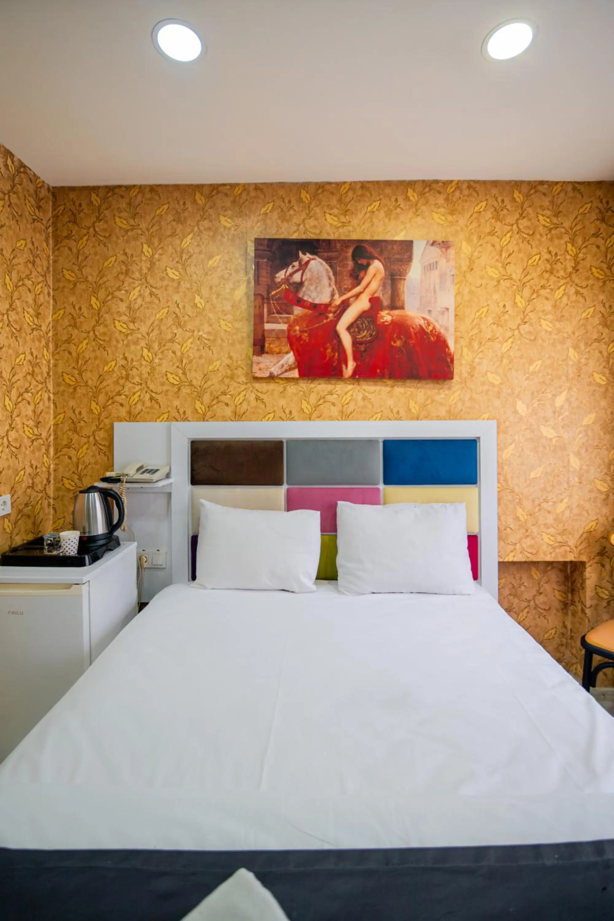 Bed in İmza Hotel Suite