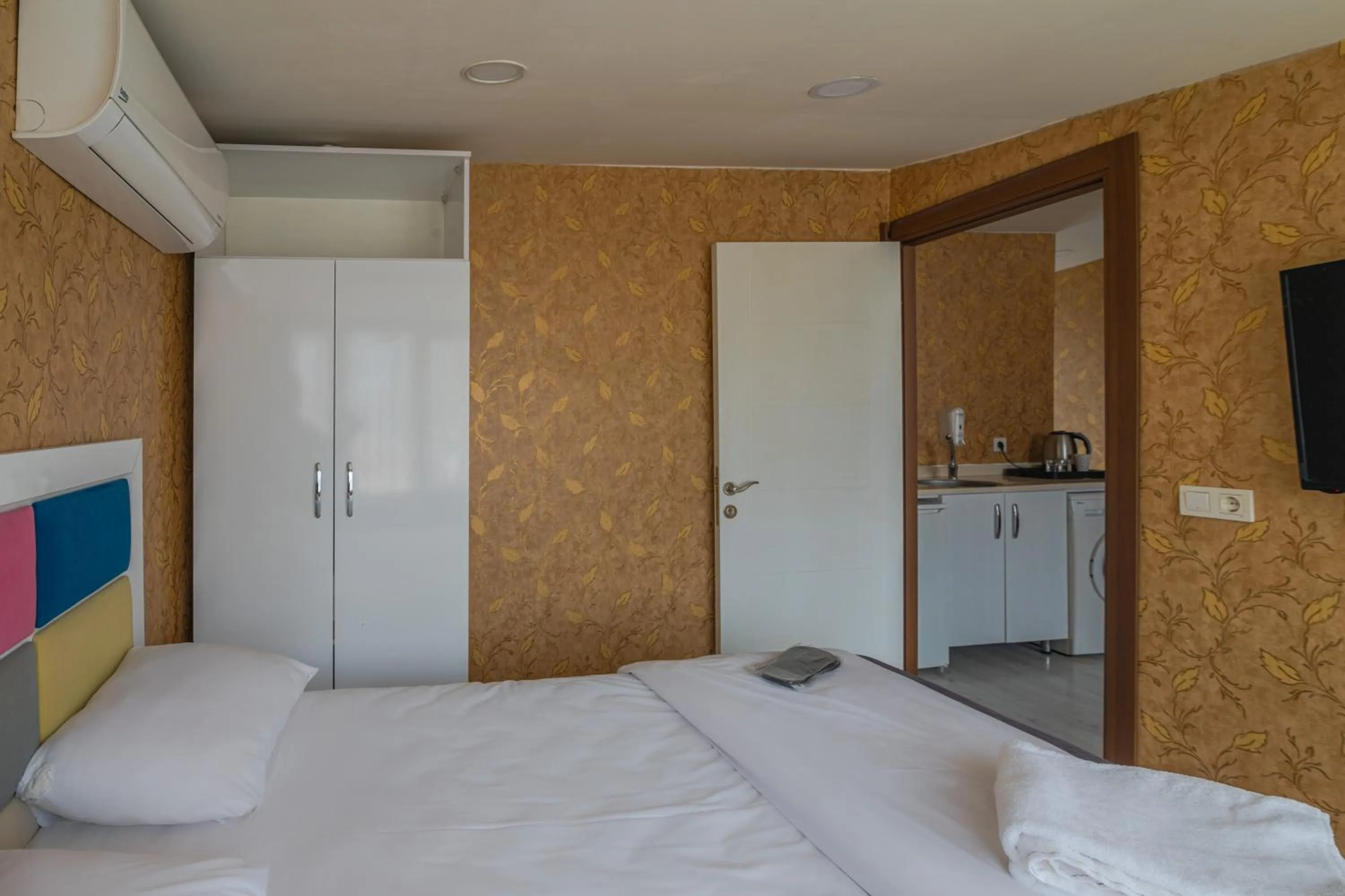 Bed in İmza Hotel Suite