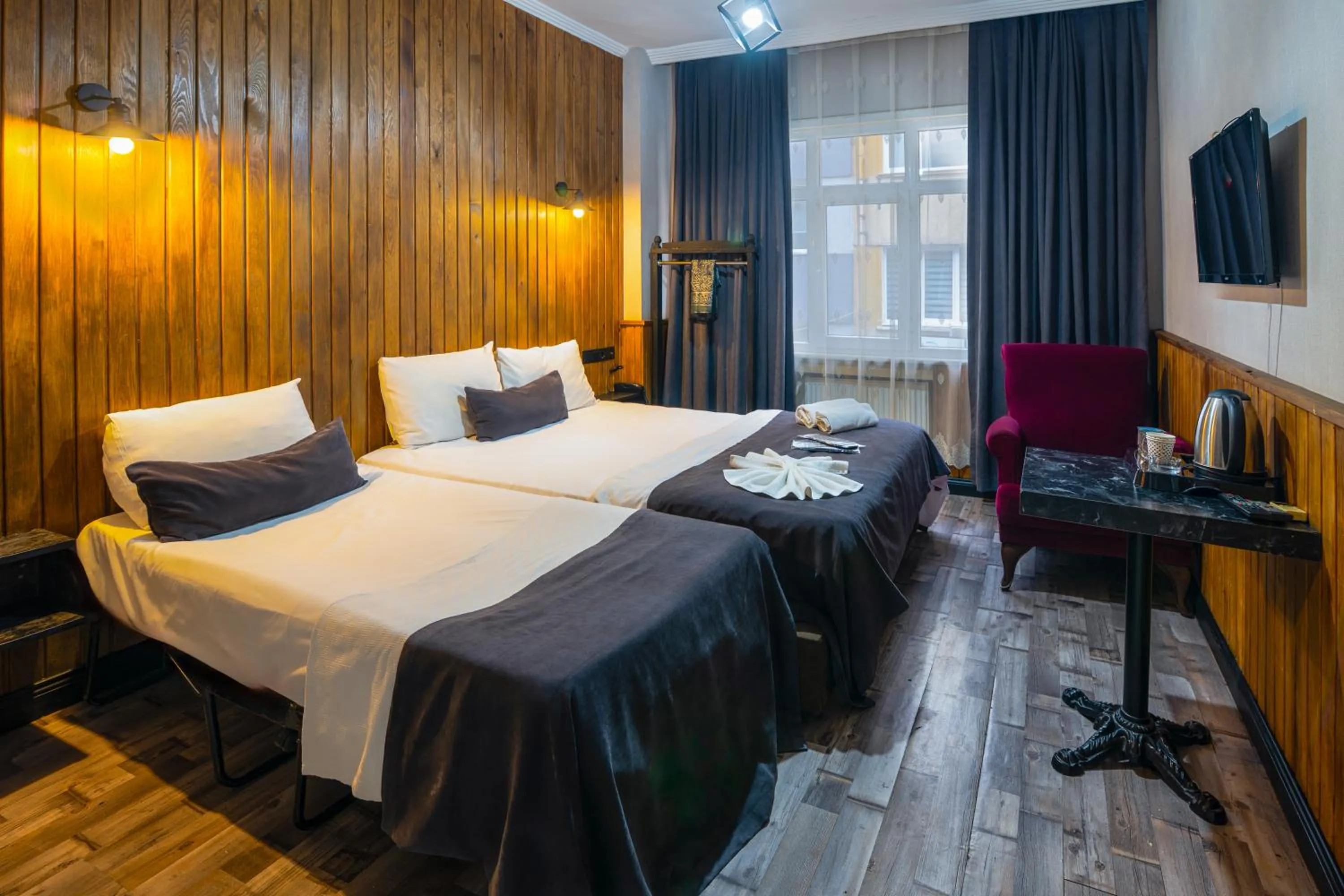 Bed in İmza Hotel Suite