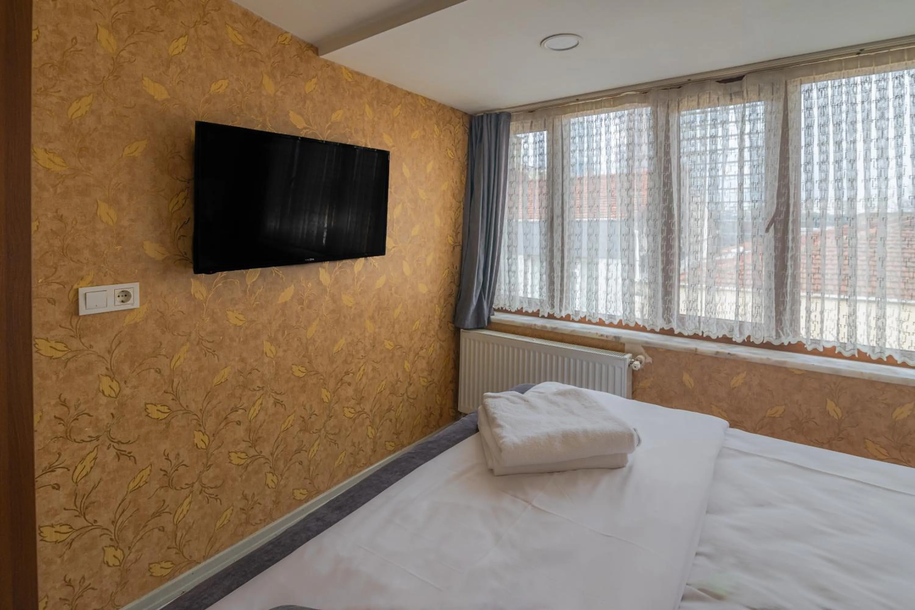 Bed in İmza Hotel Suite