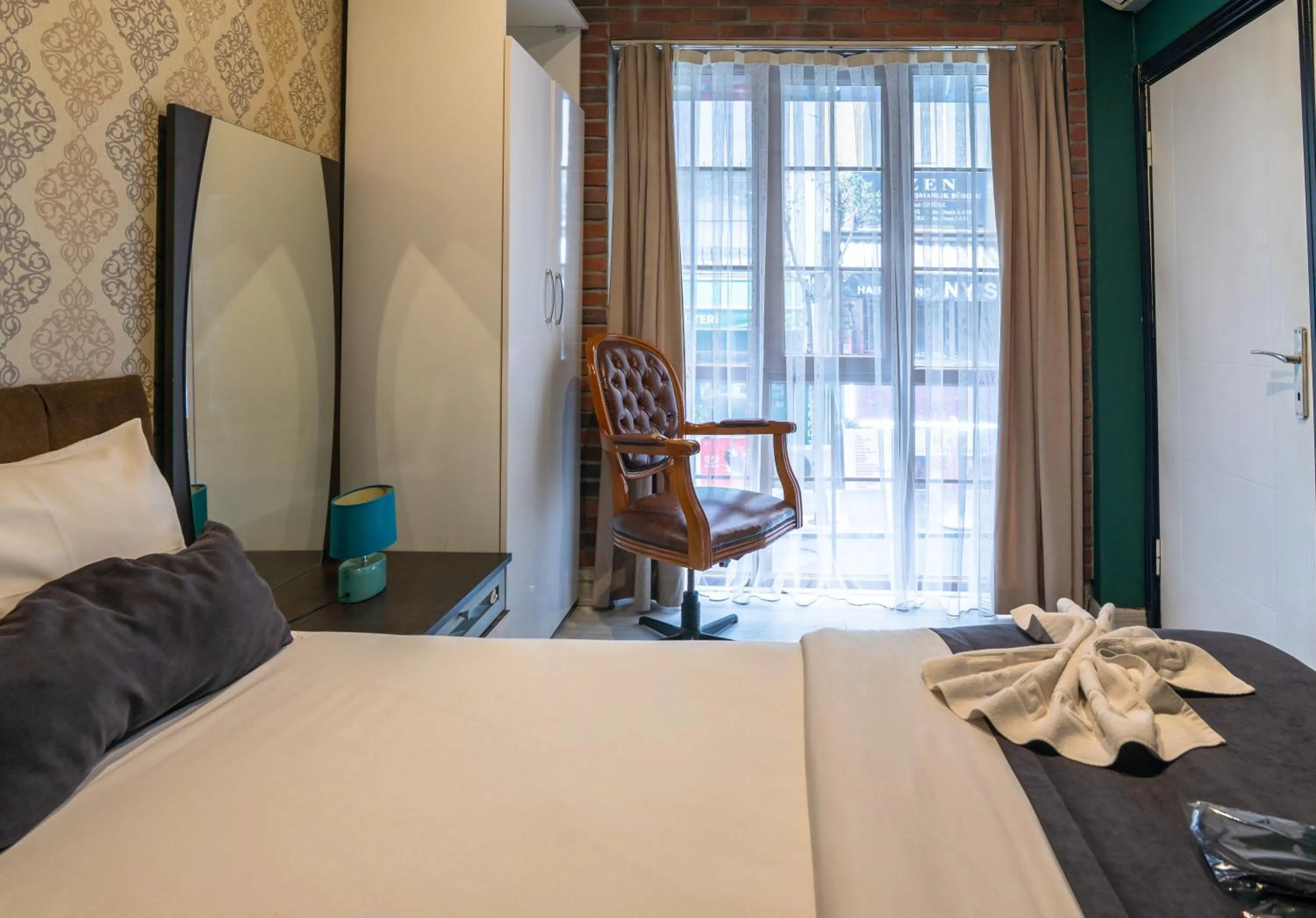 Bed in İmza Hotel Suite