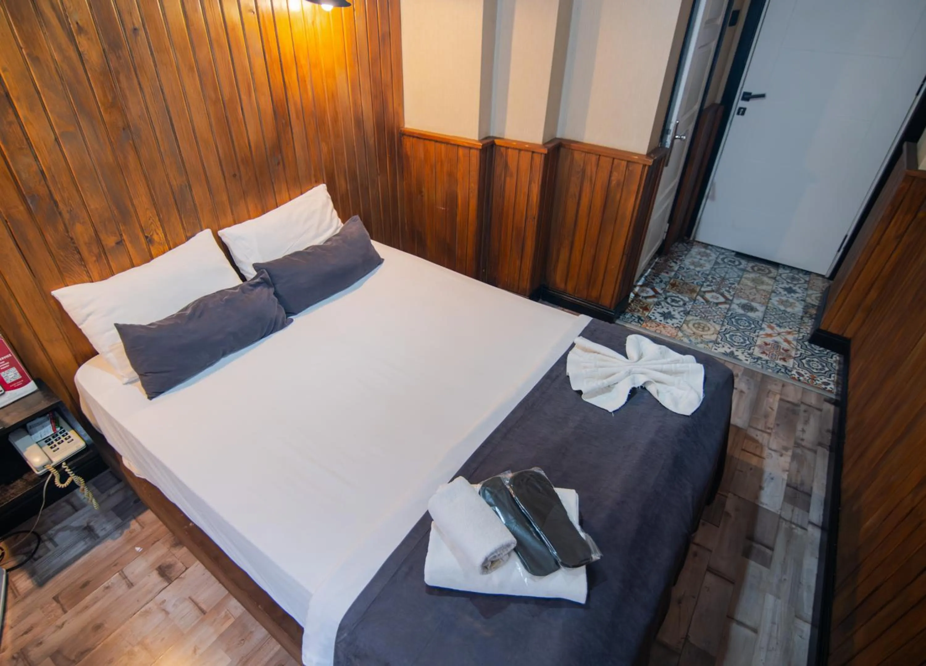 Bed in İmza Hotel Suite