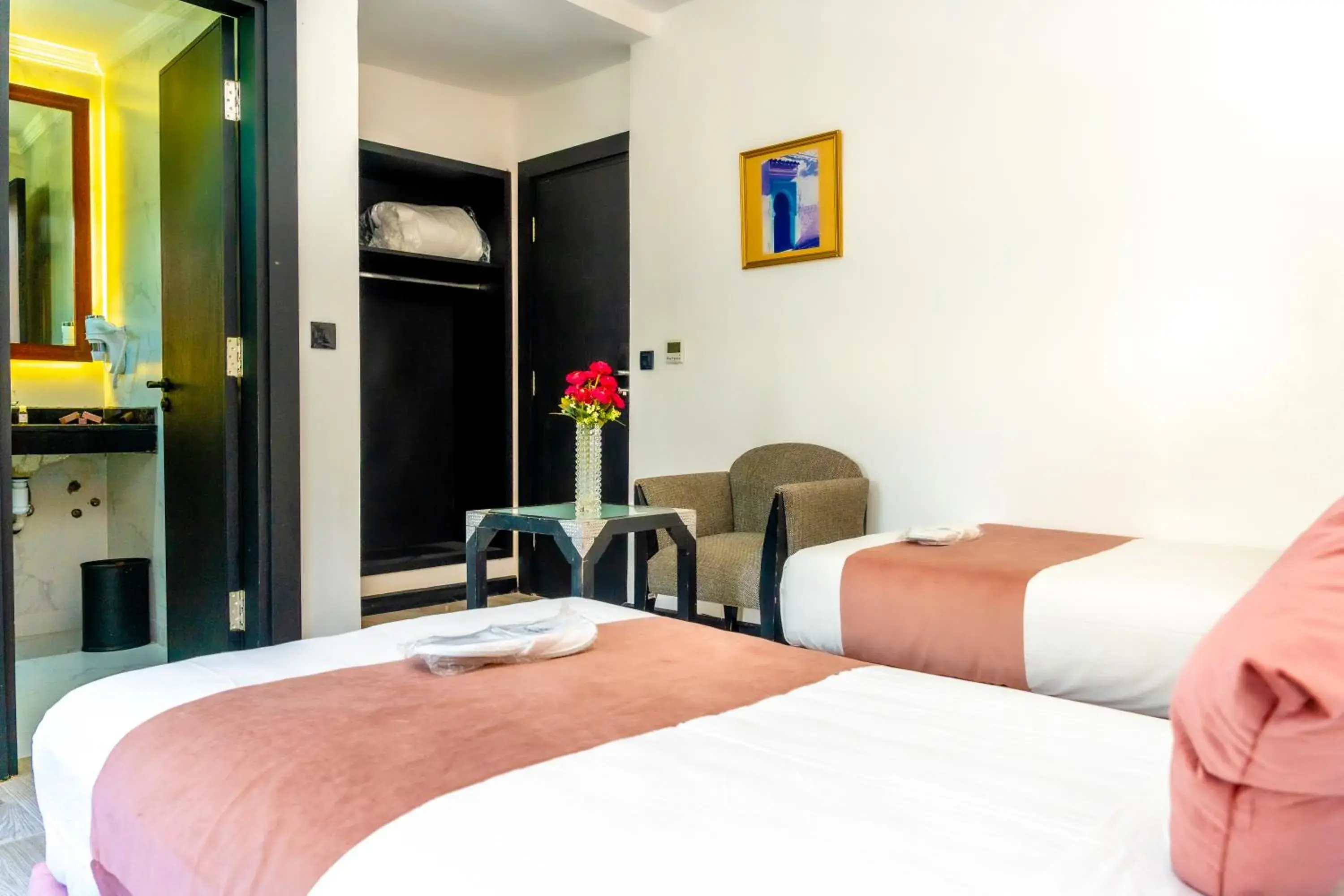 Triple Room in Hotel Les Ambassadeurs Triple Room in Hotel Les Ambassadeurs