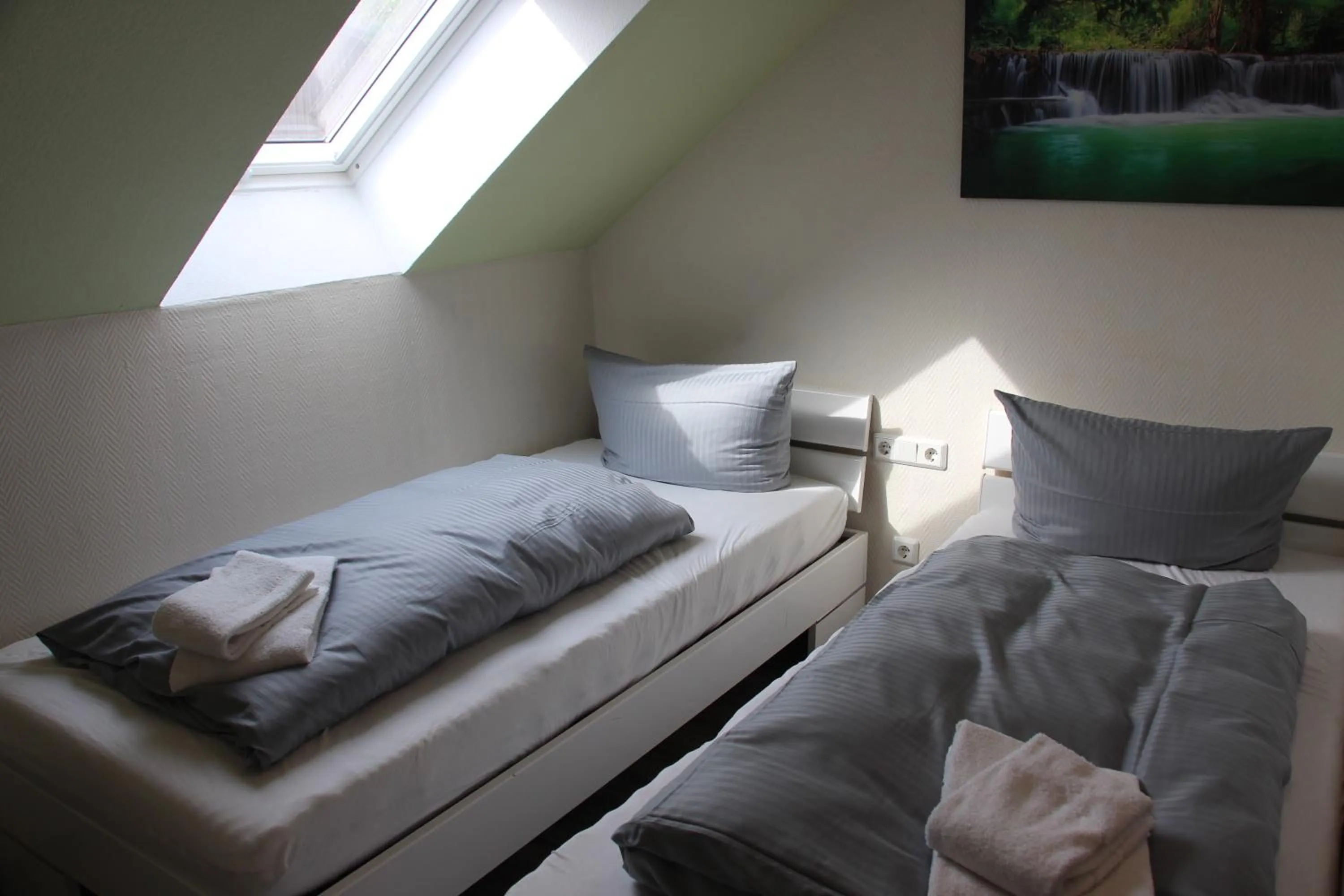 Bed in REGIOHOTEL Aparthotel Wernigerode