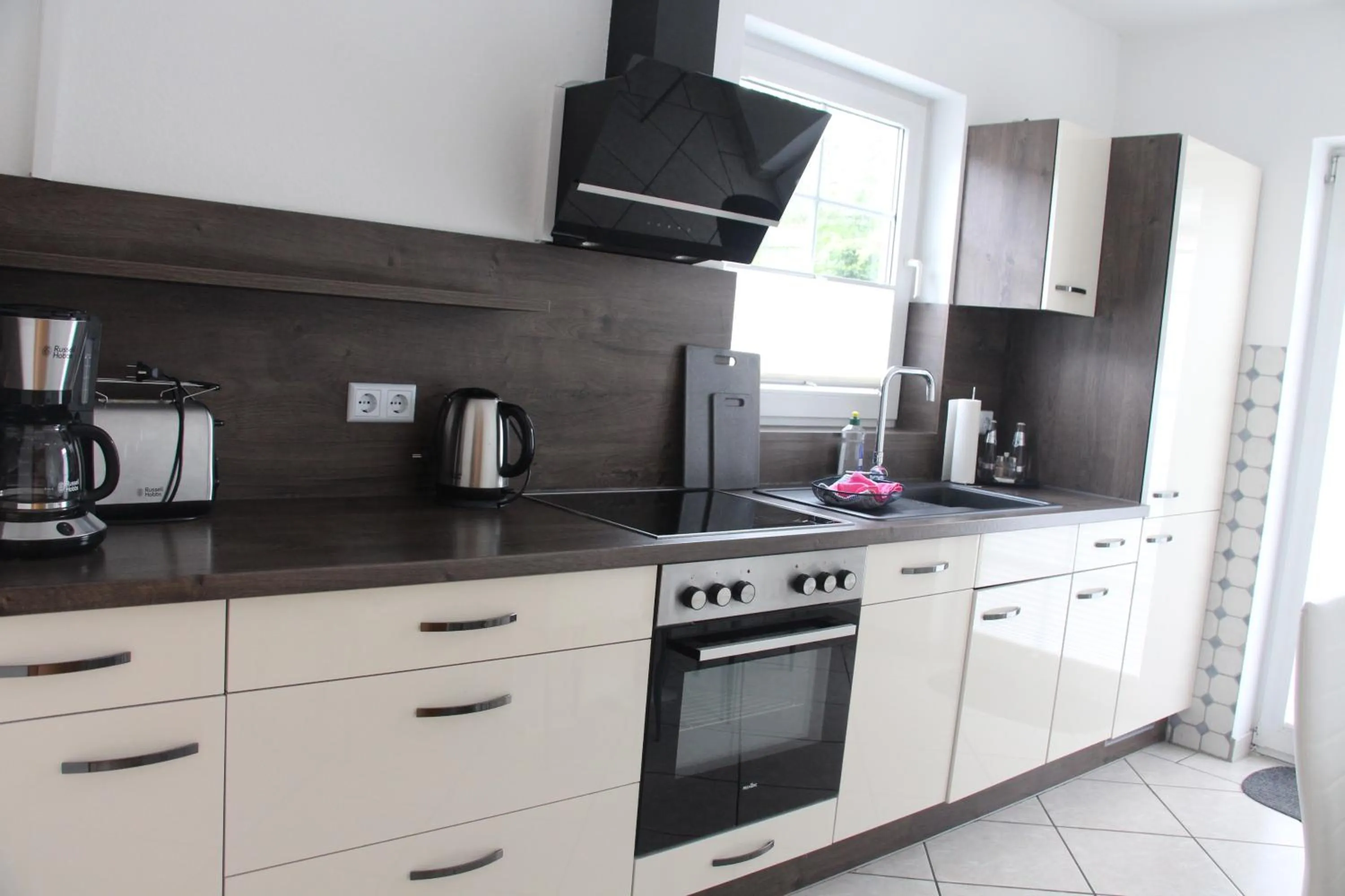 Kitchen or kitchenette in REGIOHOTEL Aparthotel Wernigerode