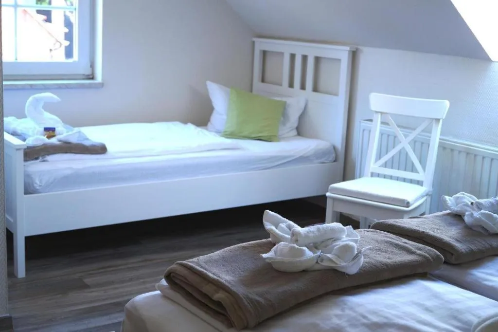 Bed in REGIOHOTEL Aparthotel Wernigerode