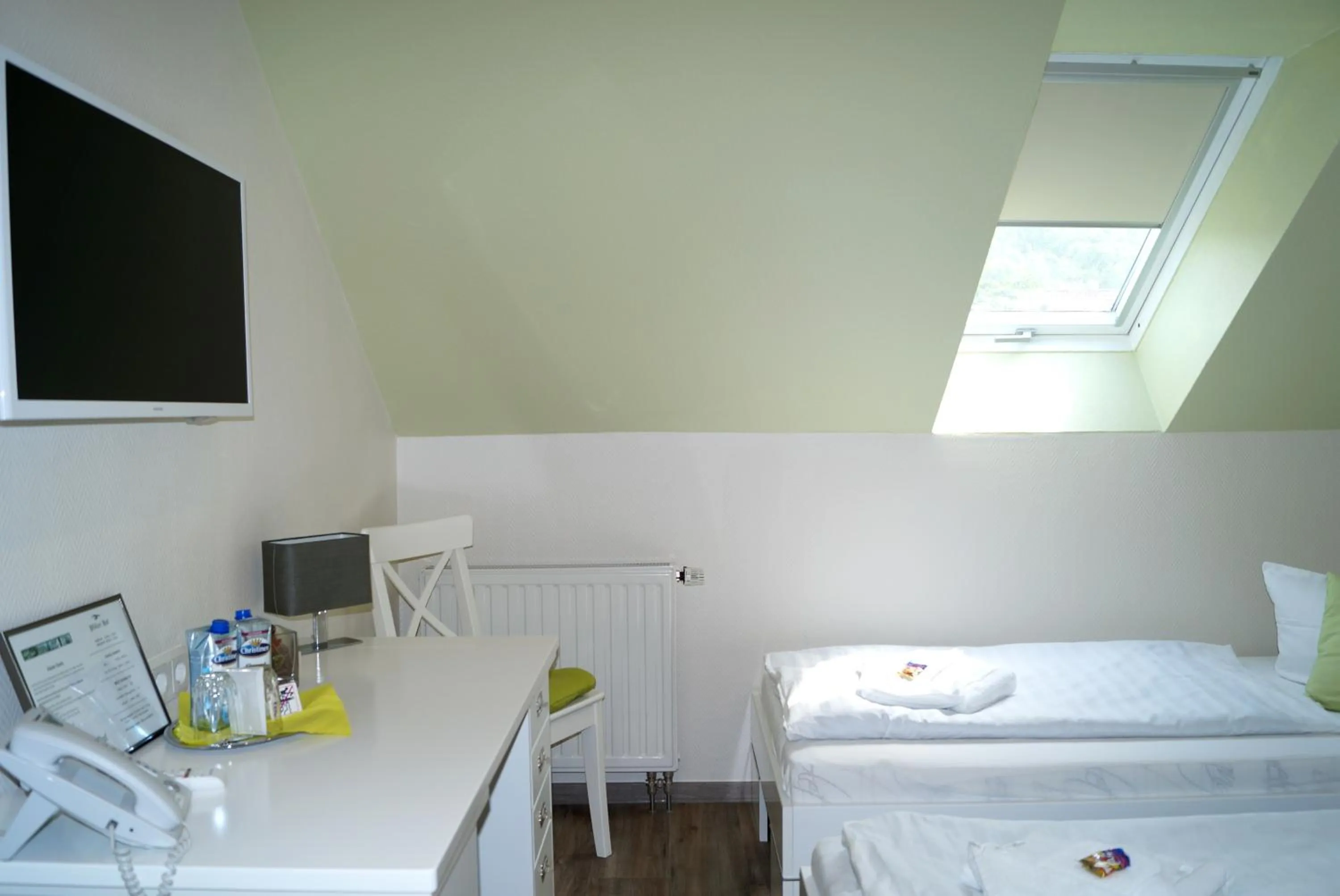 Photo of the whole room, Bed in REGIOHOTEL Aparthotel Wernigerode