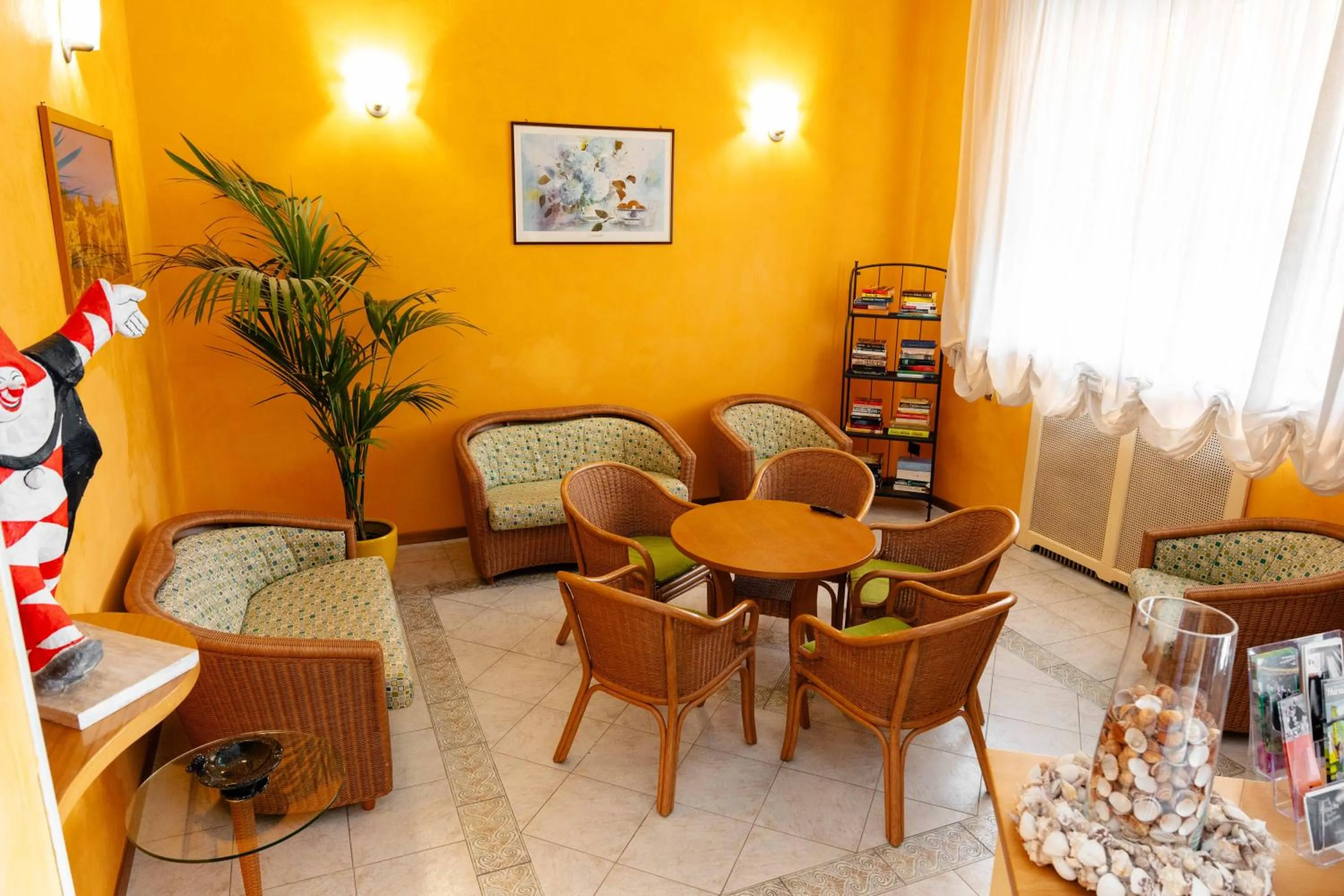 Communal lounge/ TV room in Hotel Pardini