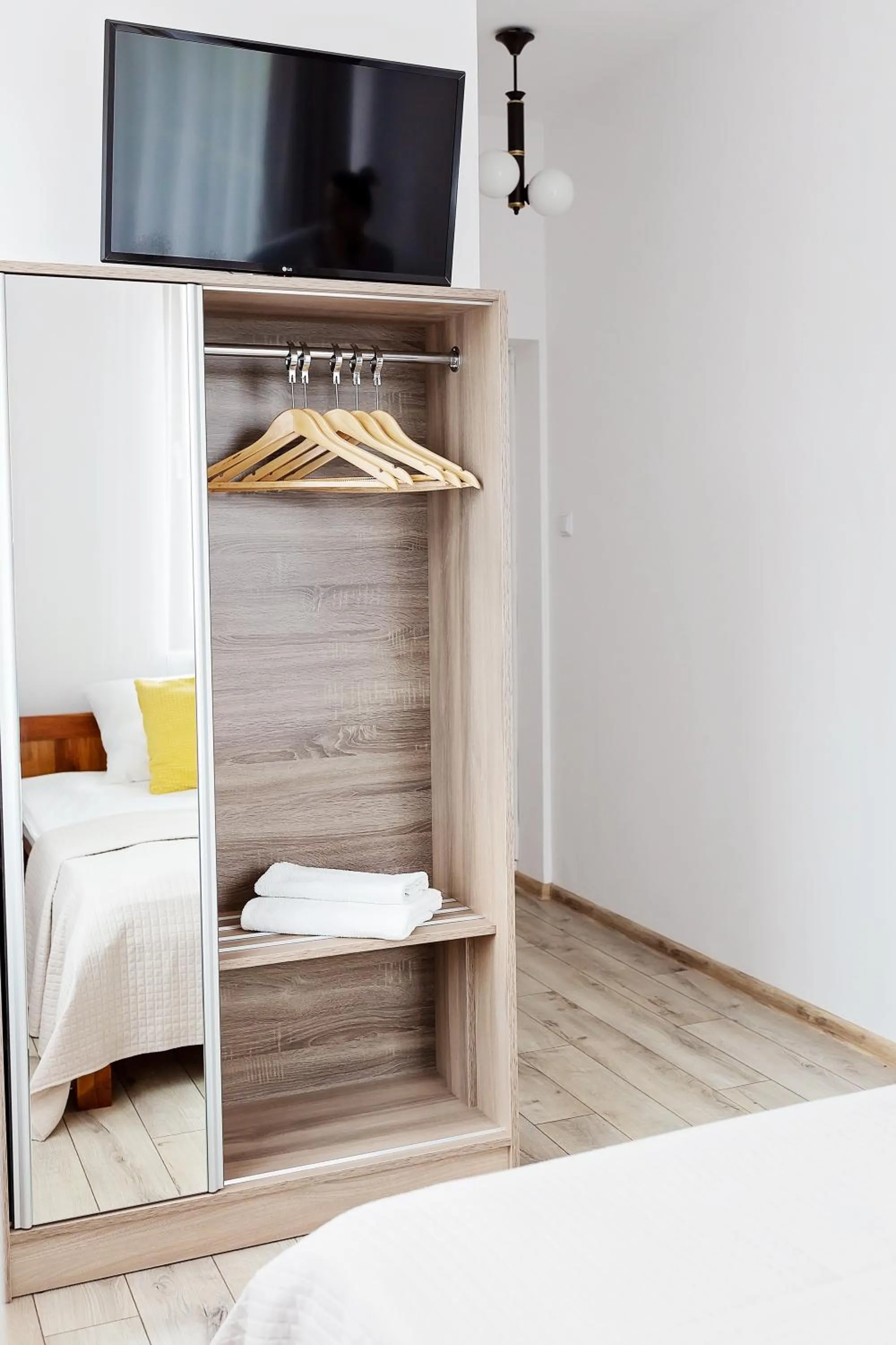 wardrobe, Bed in Janda Resort & Conference