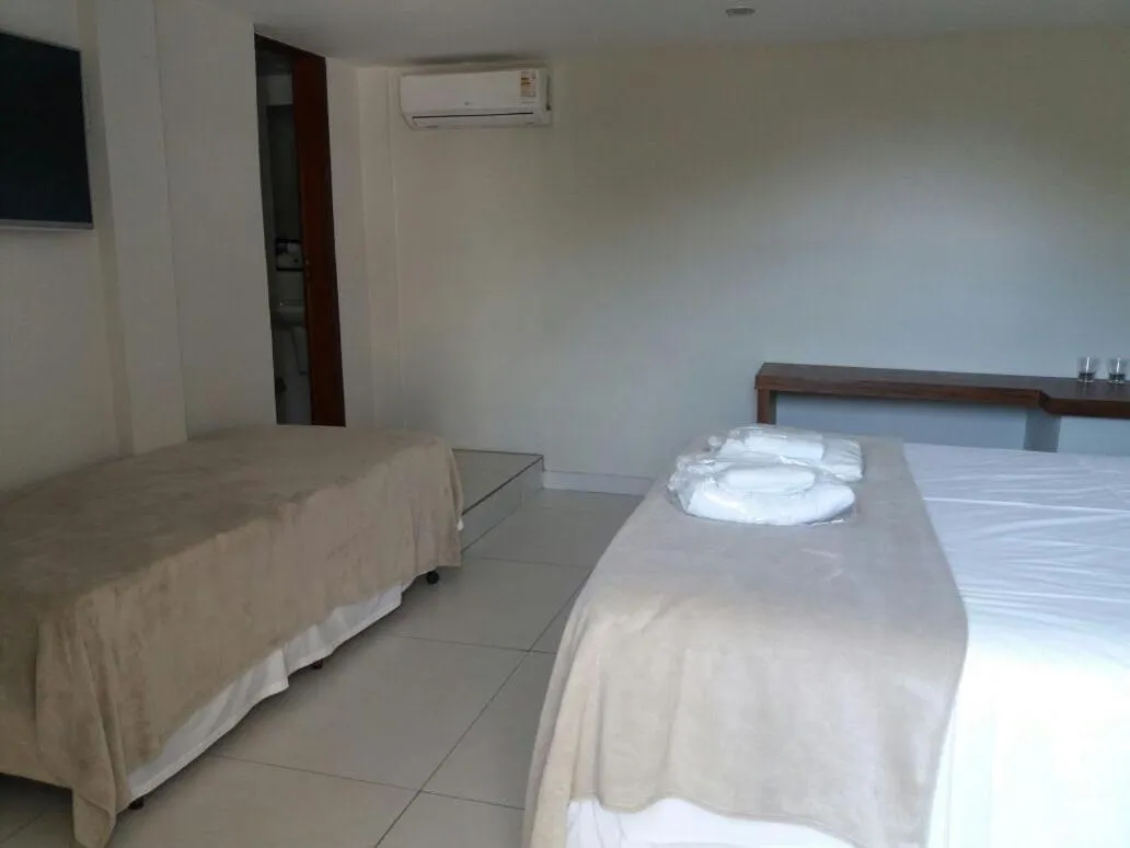 Bed in Pousada Blue Ocean