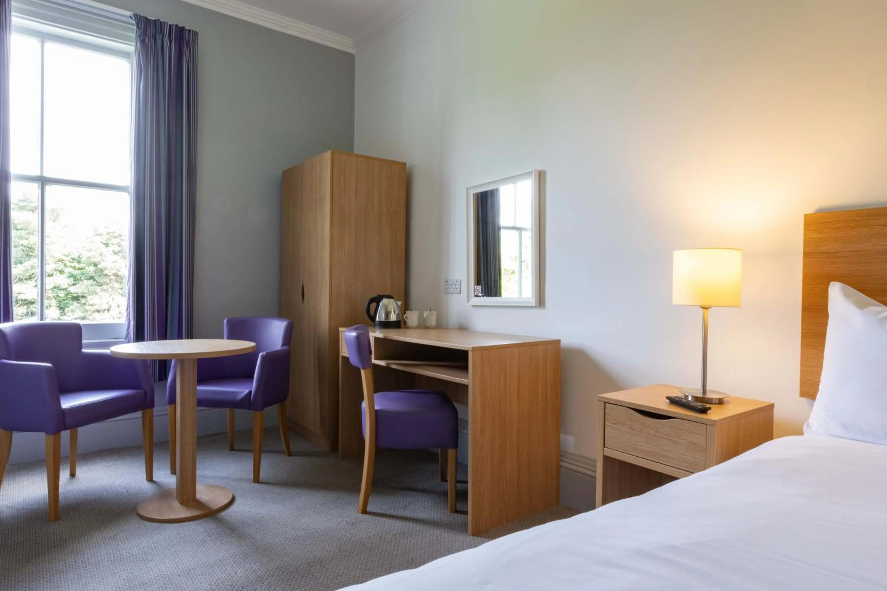 Seating area, Bed in The Waverley Castle Hotel