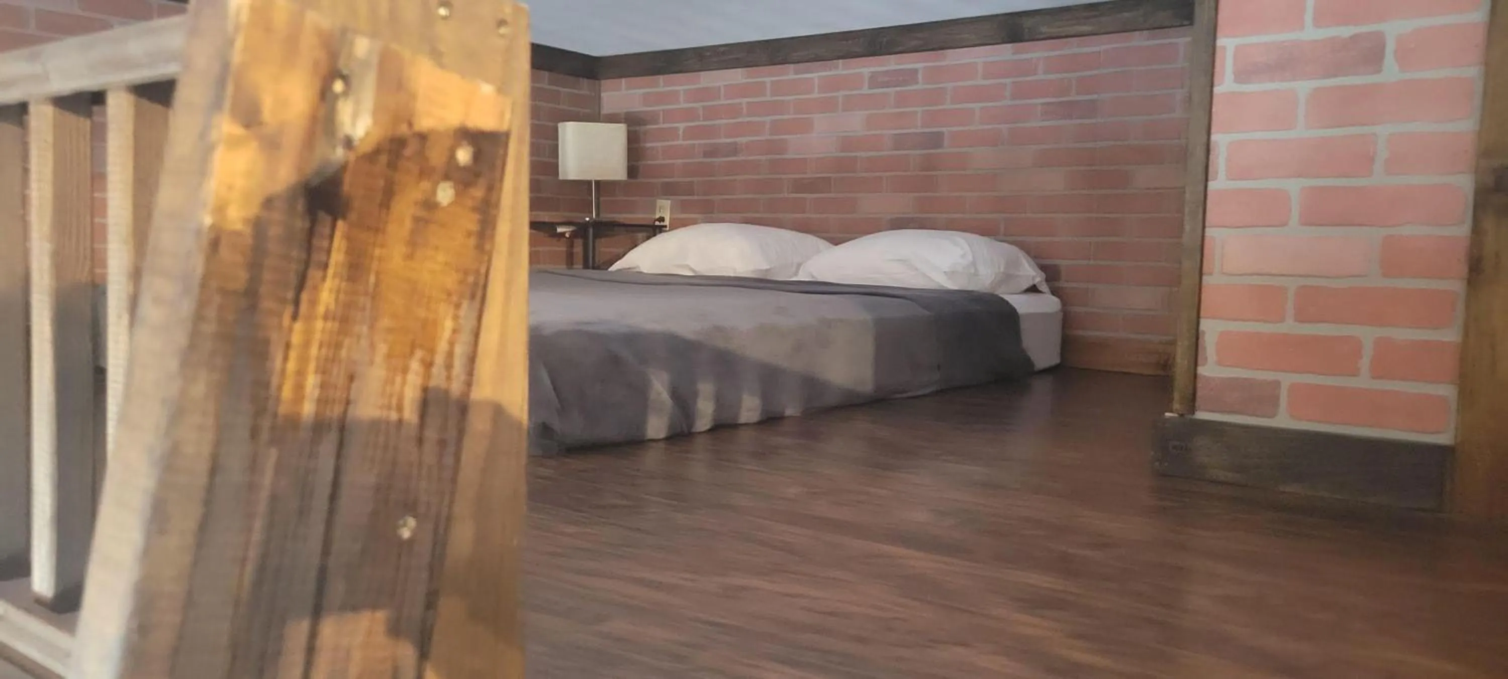 Bed in Downhill Lodge Condominium