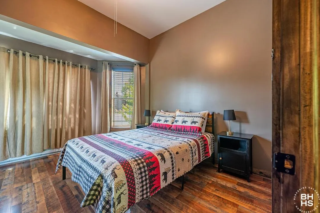 Bed in Downhill Lodge Condominium