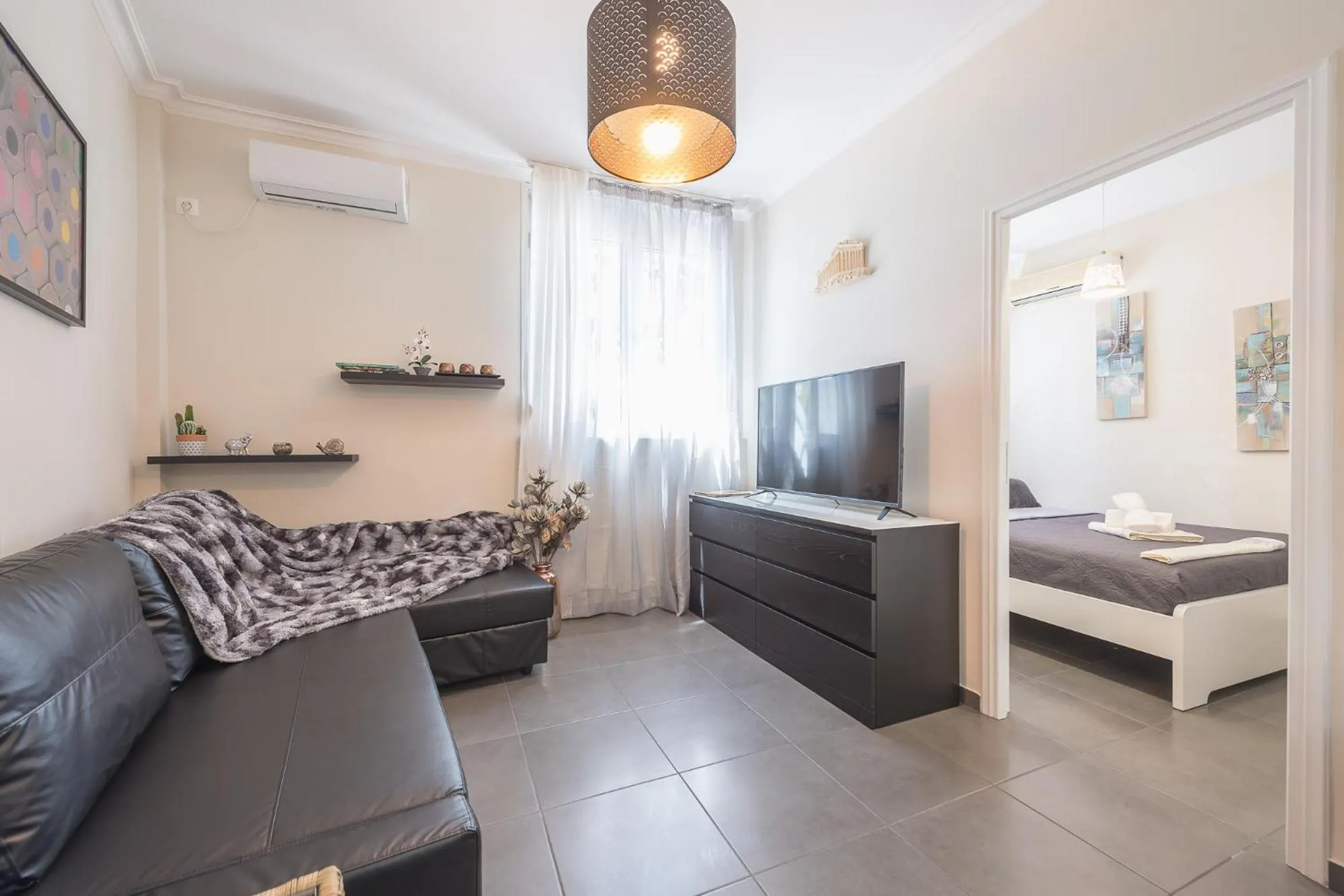 Seating area, Bed in Drakou Studio