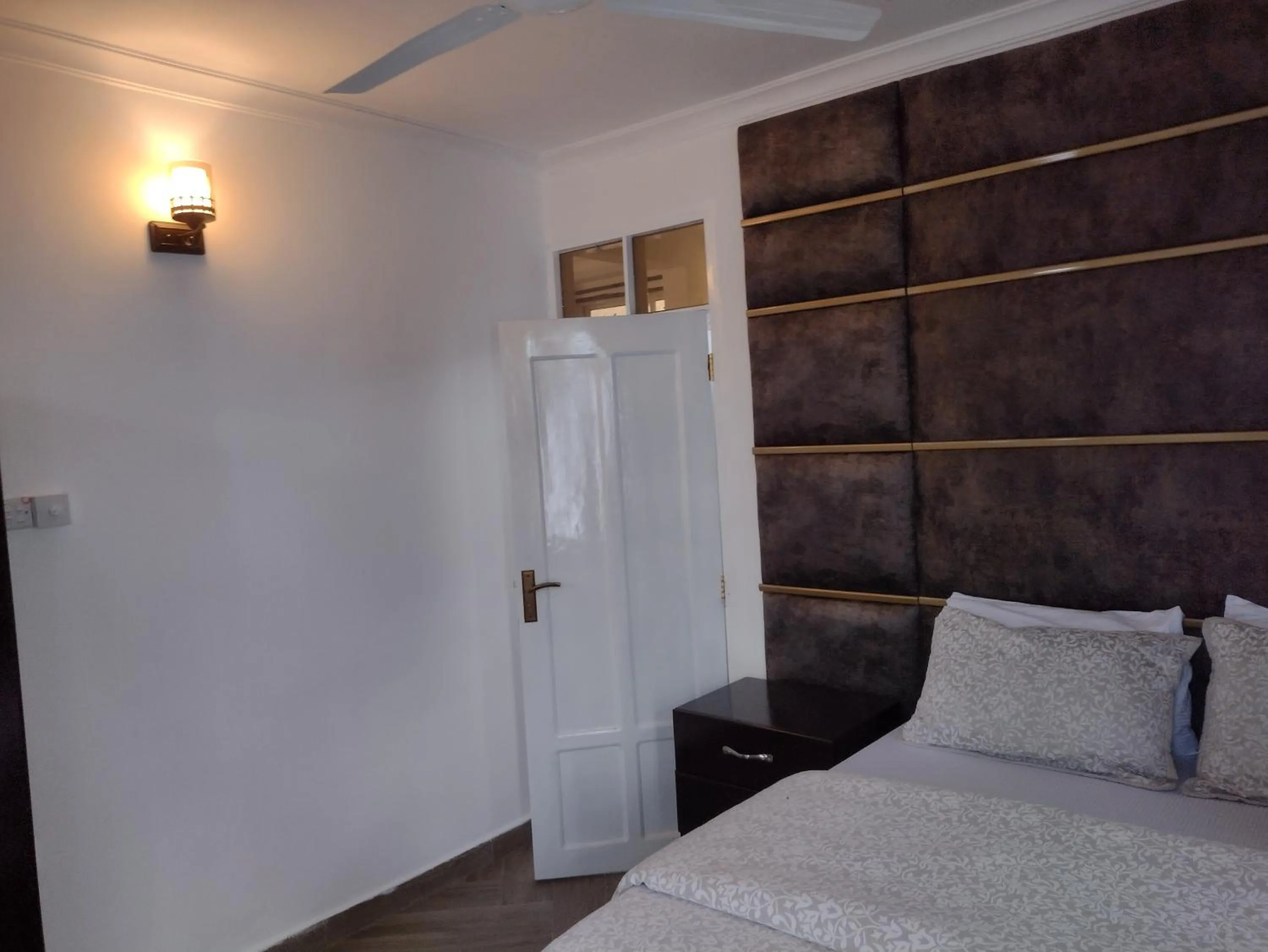Bedroom, Bed in Mkamiti Villa - Airport Hotel with Free Shuttle