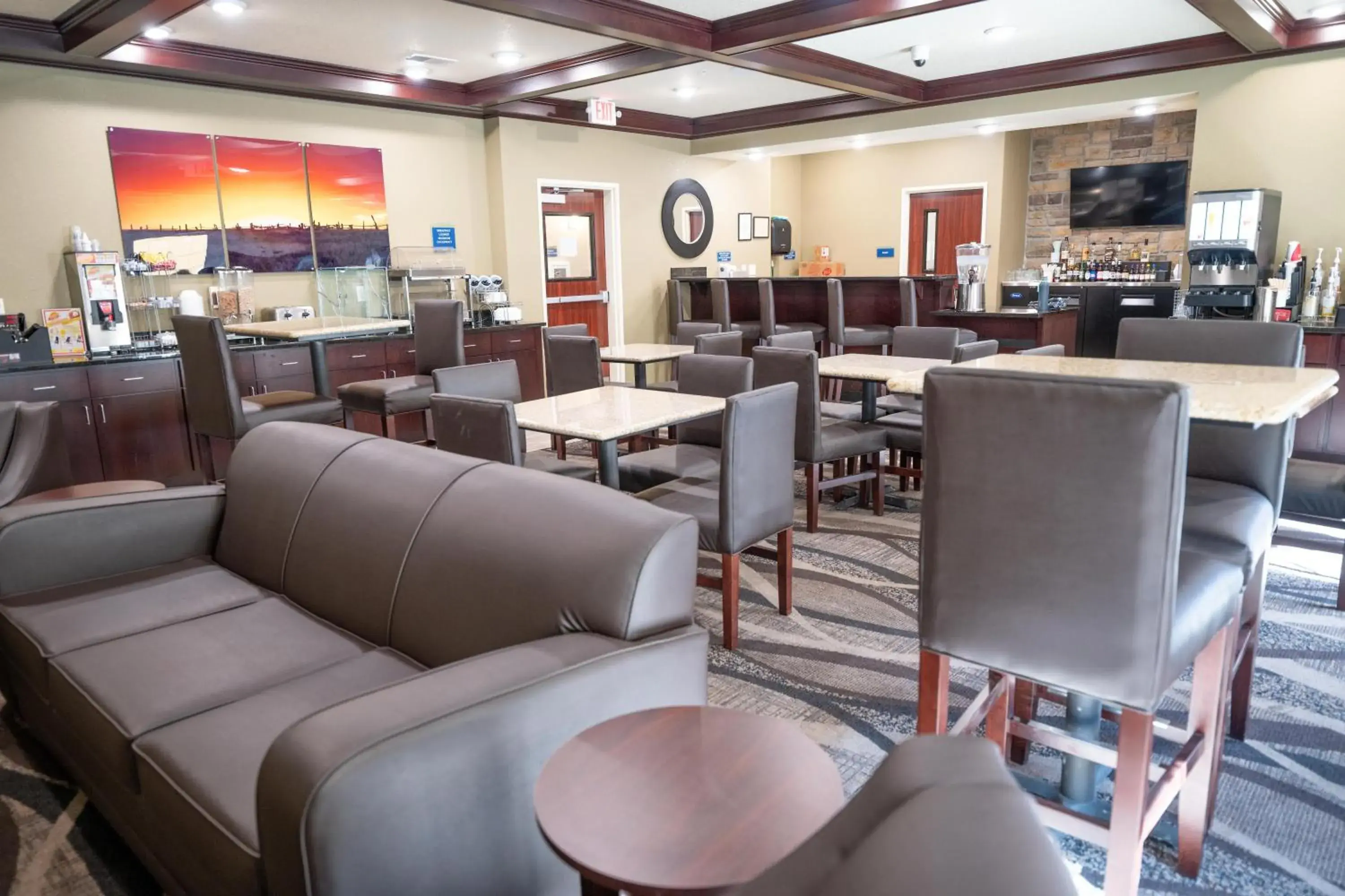 Lounge or bar in Cobblestone Hotel & Suites - Lamar Lounge or bar in Cobblestone Hotel & Suites - Lamar