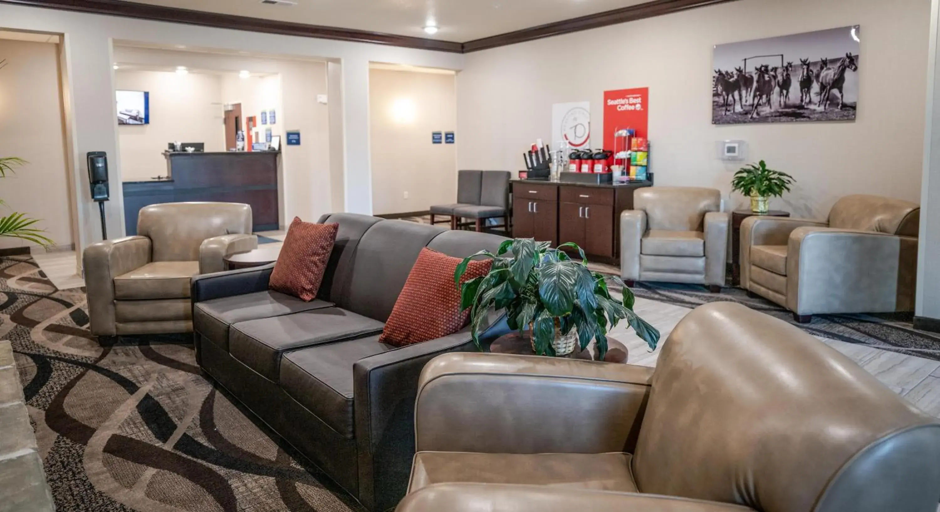 Lobby or reception in Cobblestone Hotel & Suites - Lamar Lobby or reception in Cobblestone Hotel & Suites - Lamar