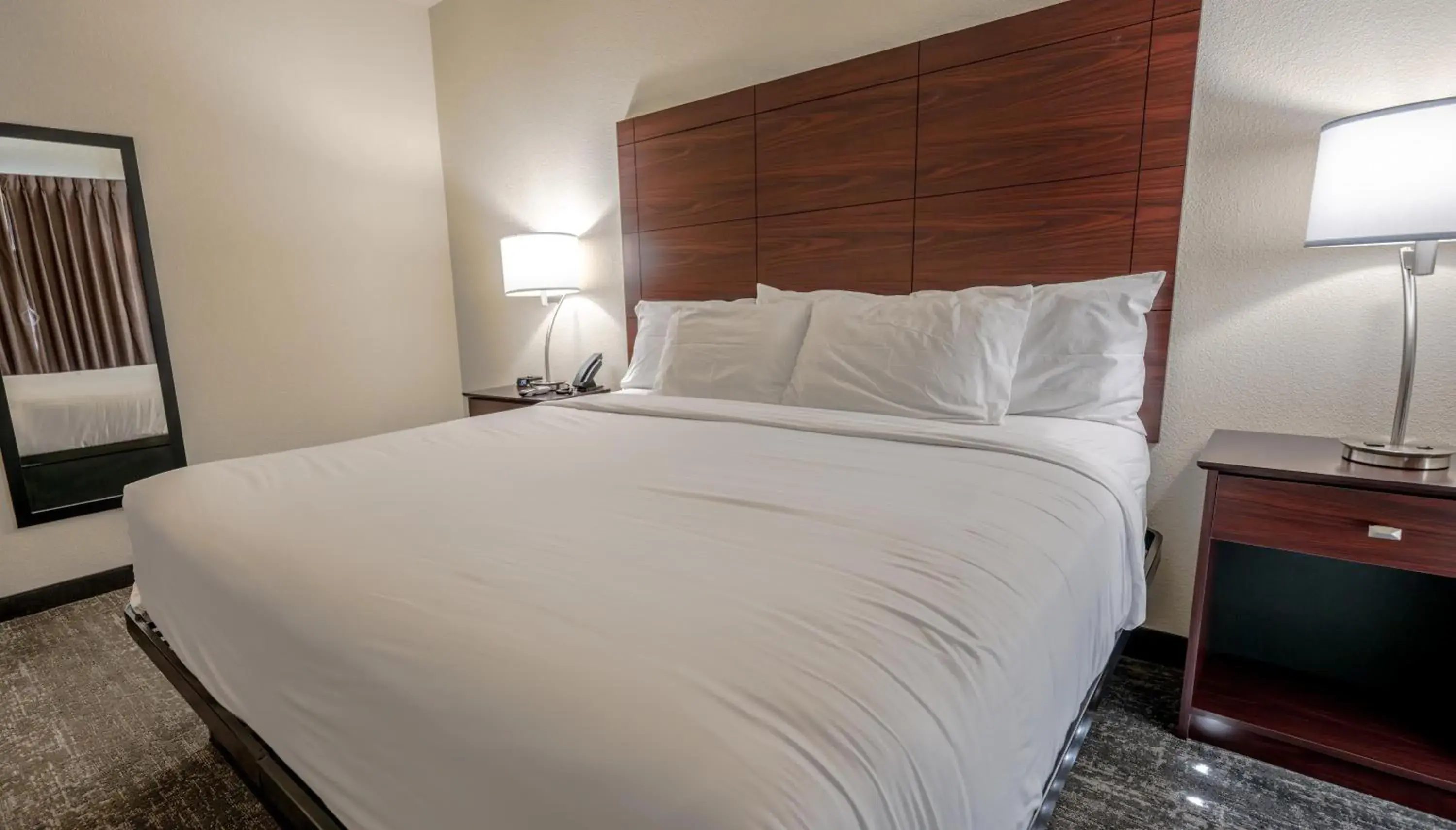 Bed in Cobblestone Hotel & Suites - Lamar Bed in Cobblestone Hotel & Suites - Lamar