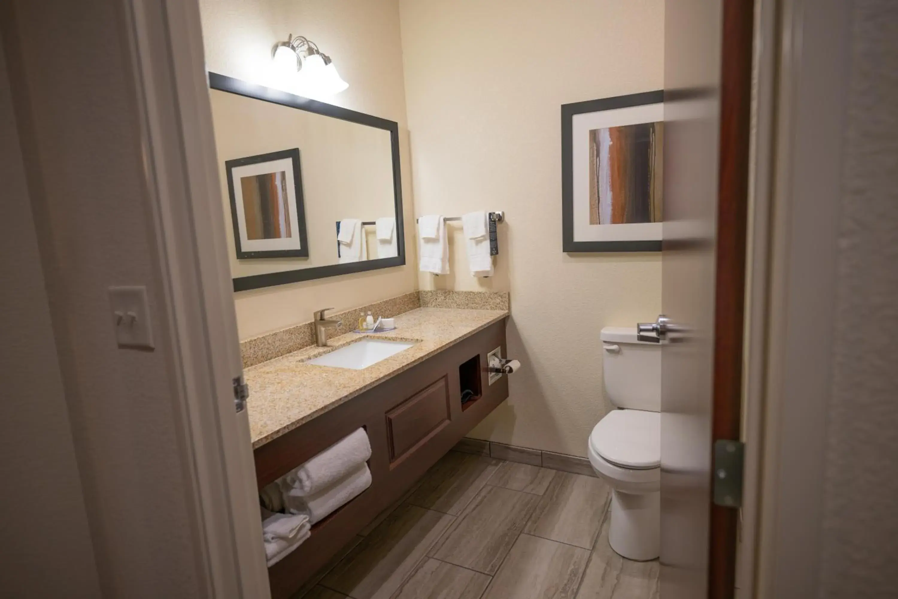 Bathroom in Cobblestone Hotel & Suites - Lamar Bathroom in Cobblestone Hotel & Suites - Lamar