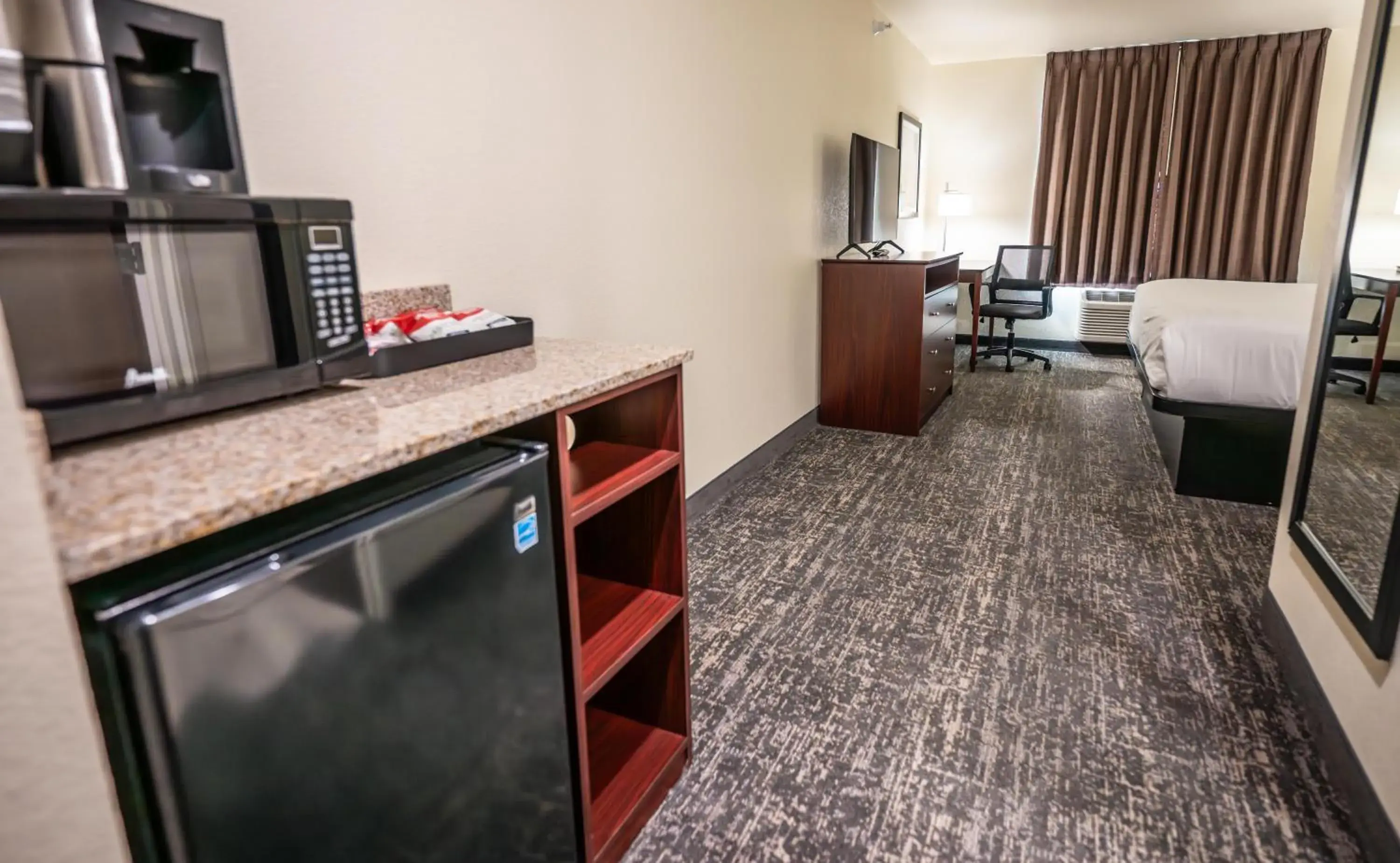 Bedroom in Cobblestone Hotel & Suites - Lamar Bedroom in Cobblestone Hotel & Suites - Lamar