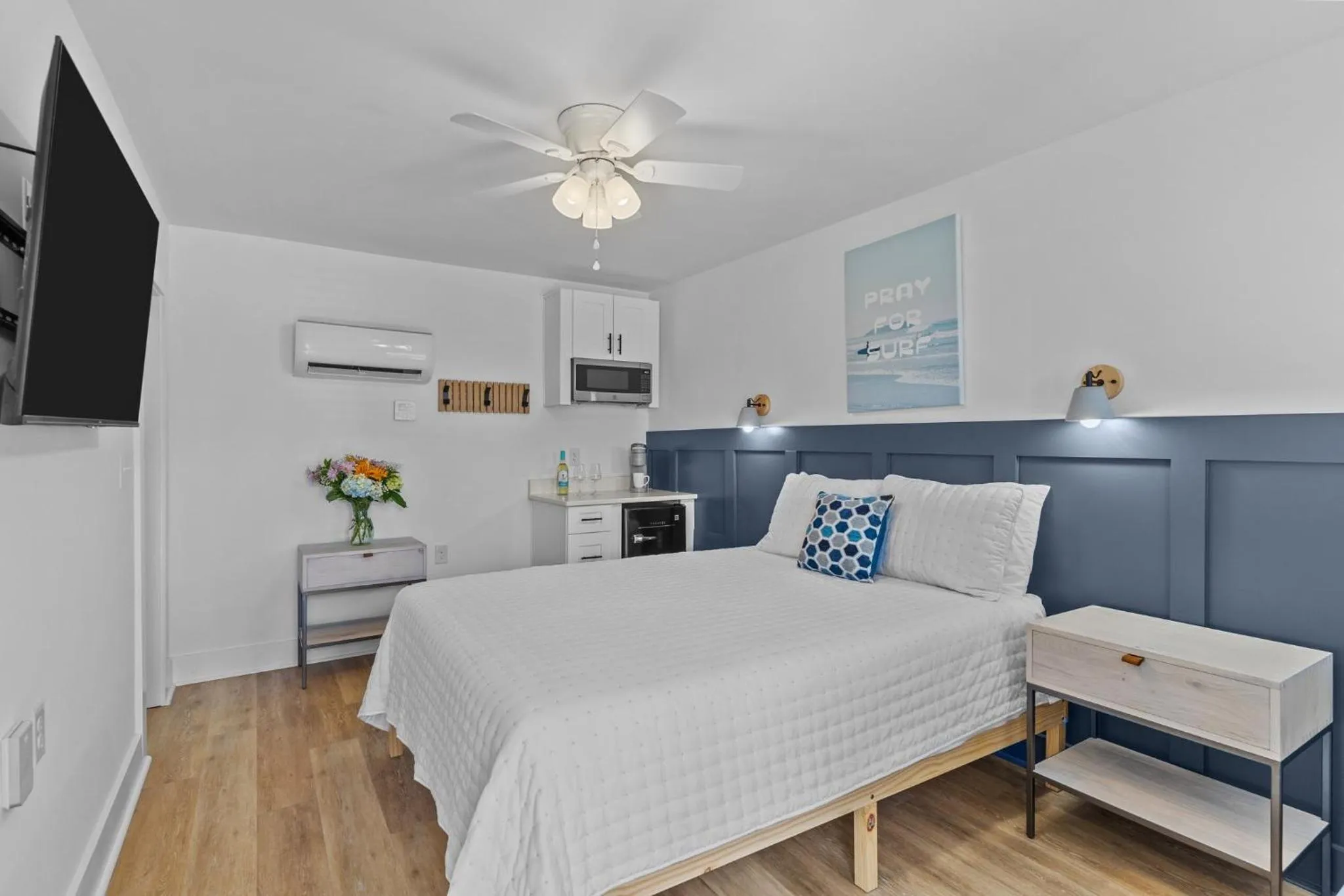 Bed in The Beach House at Oak Island by Carolina Resorts