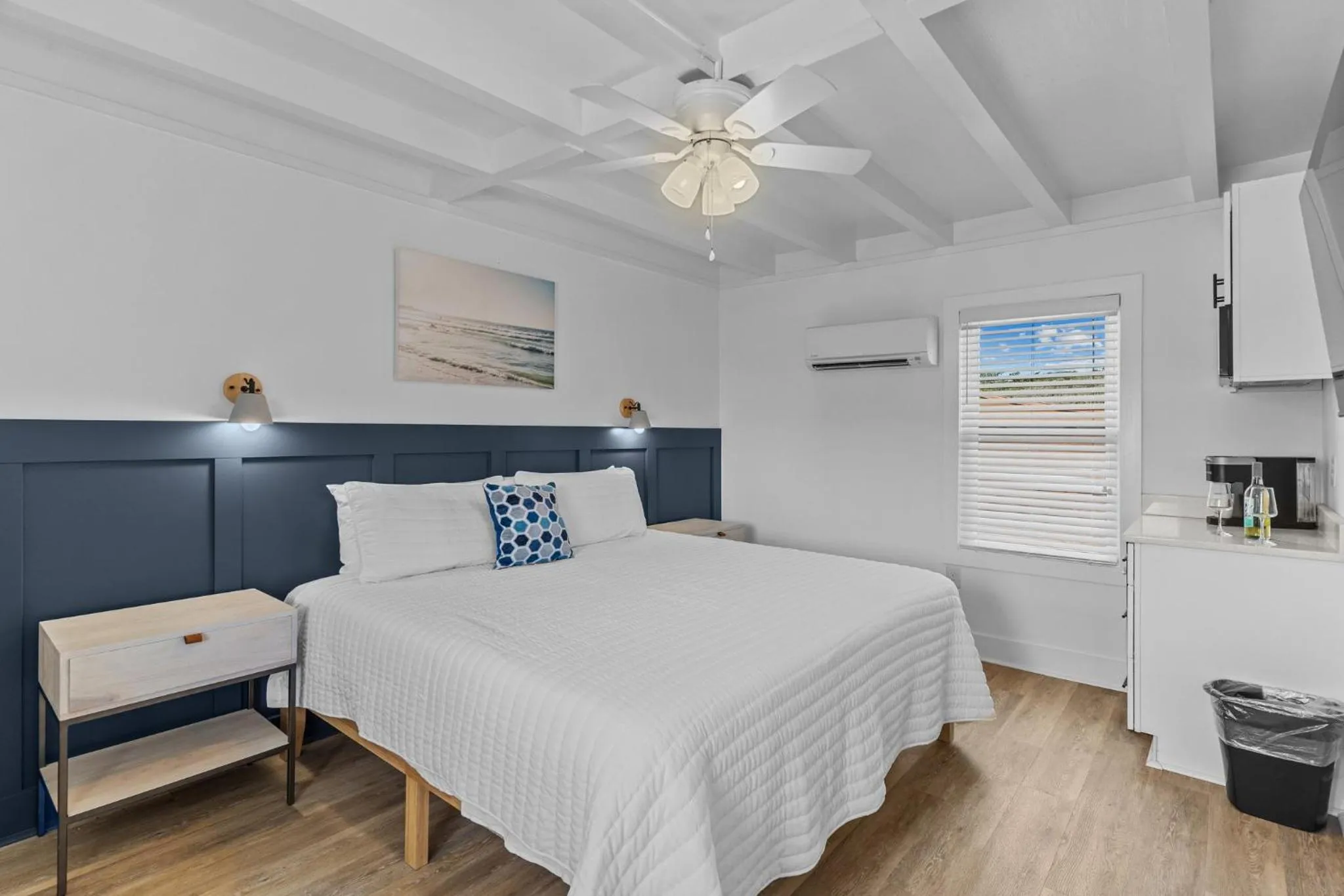 Bed in The Beach House at Oak Island by Carolina Resorts