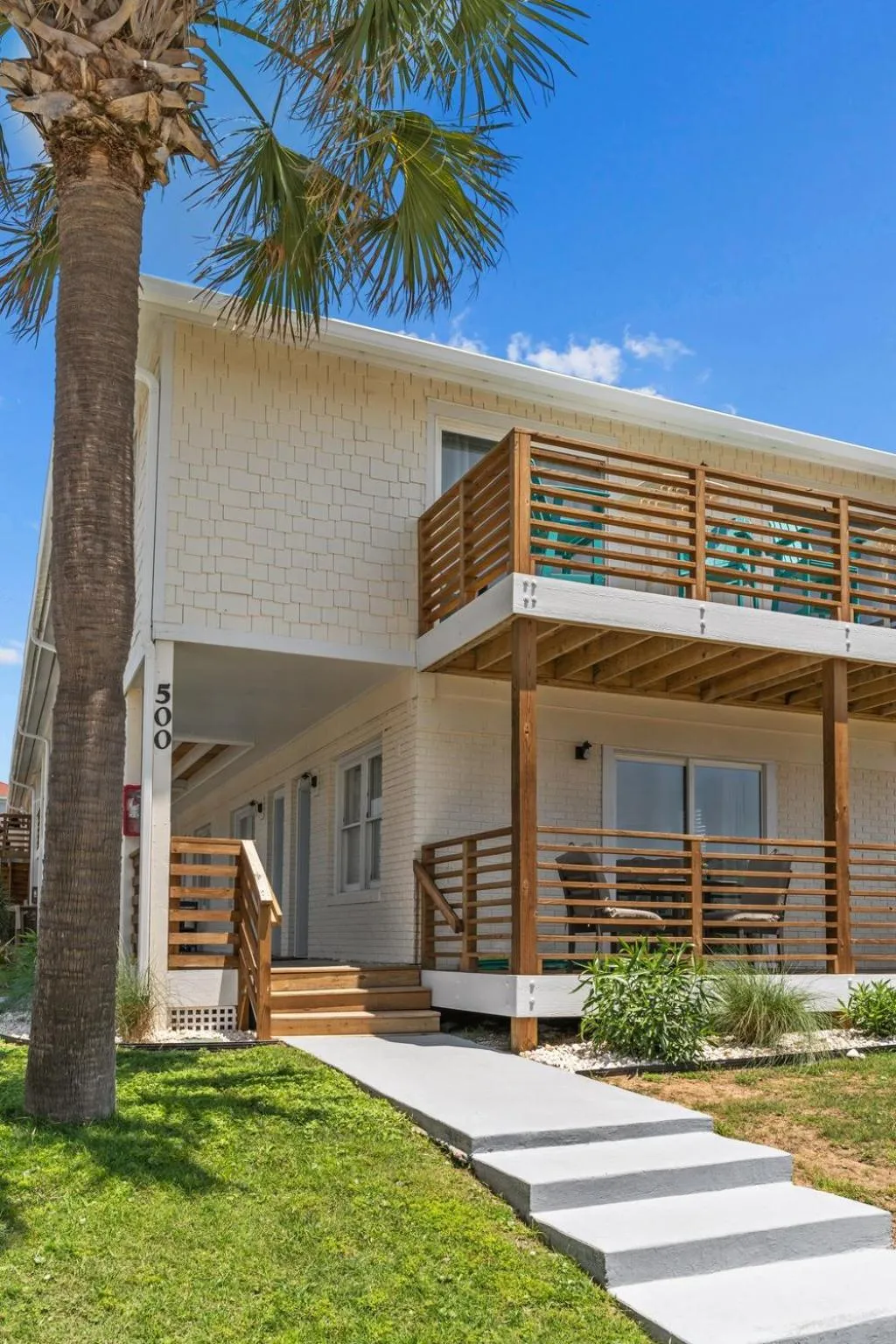 Property building in The Beach House at Oak Island by Carolina Resorts