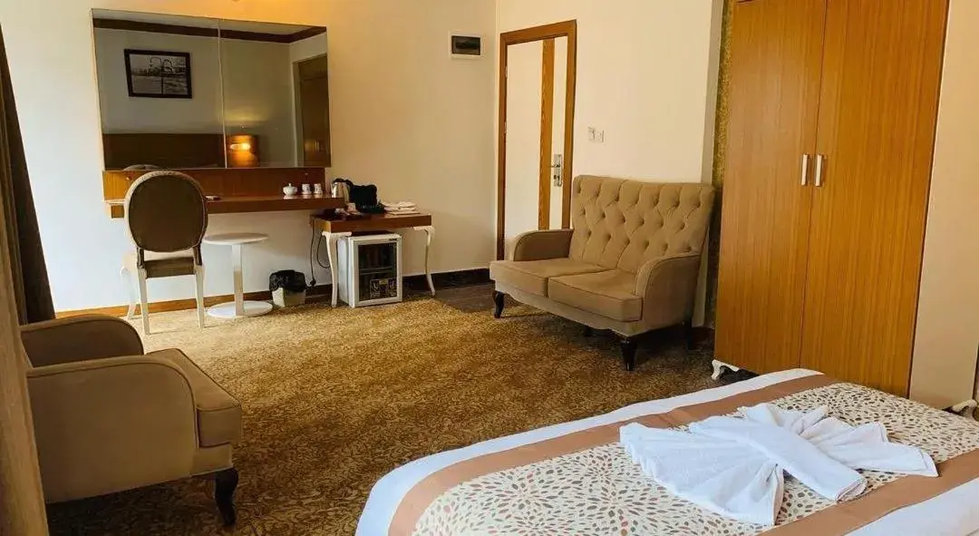 Photo of the whole room, Bed in Uluhan Hotel Photo of the whole room, Bed in Uluhan Hotel