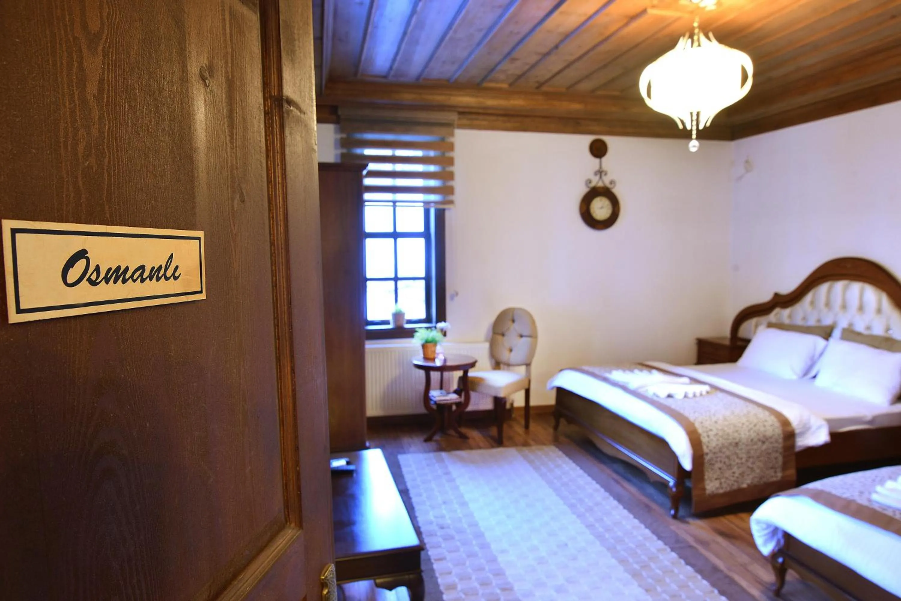 Photo of the whole room, Bed in Uluhan Hotel