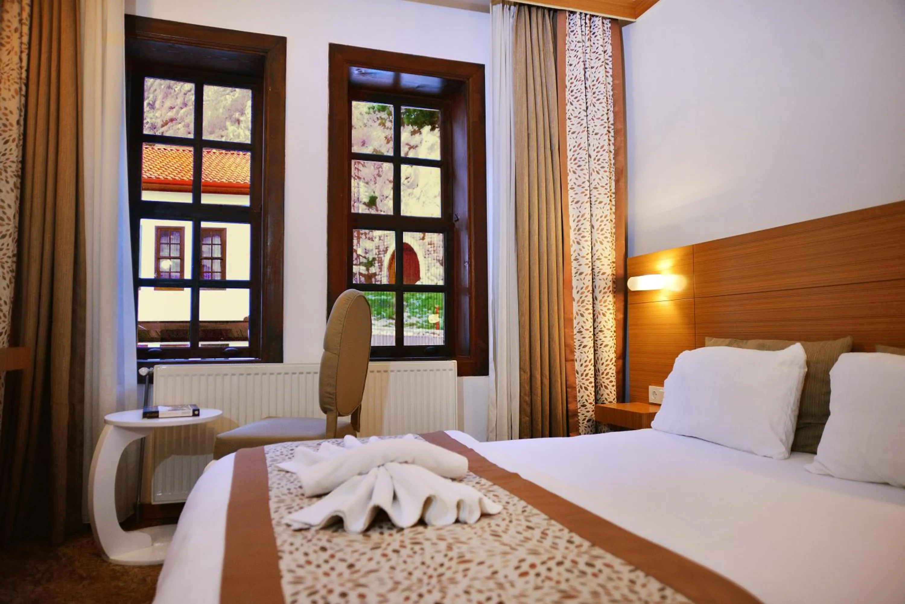 Photo of the whole room, Bed in Uluhan Hotel