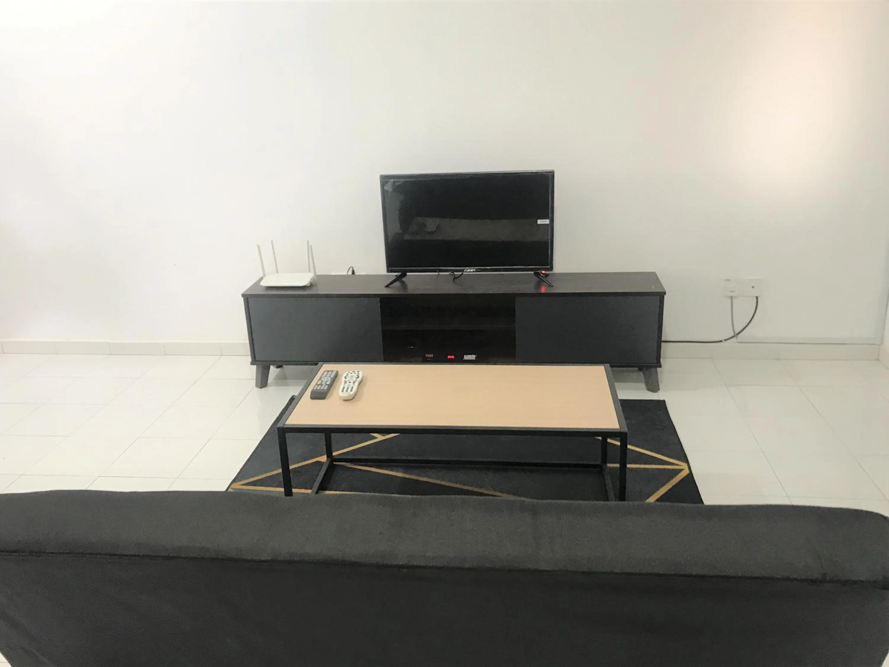 Living room in OYO 90493 JL Homestay