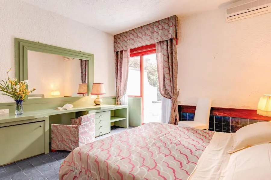 Bed in Marina Club Hotel