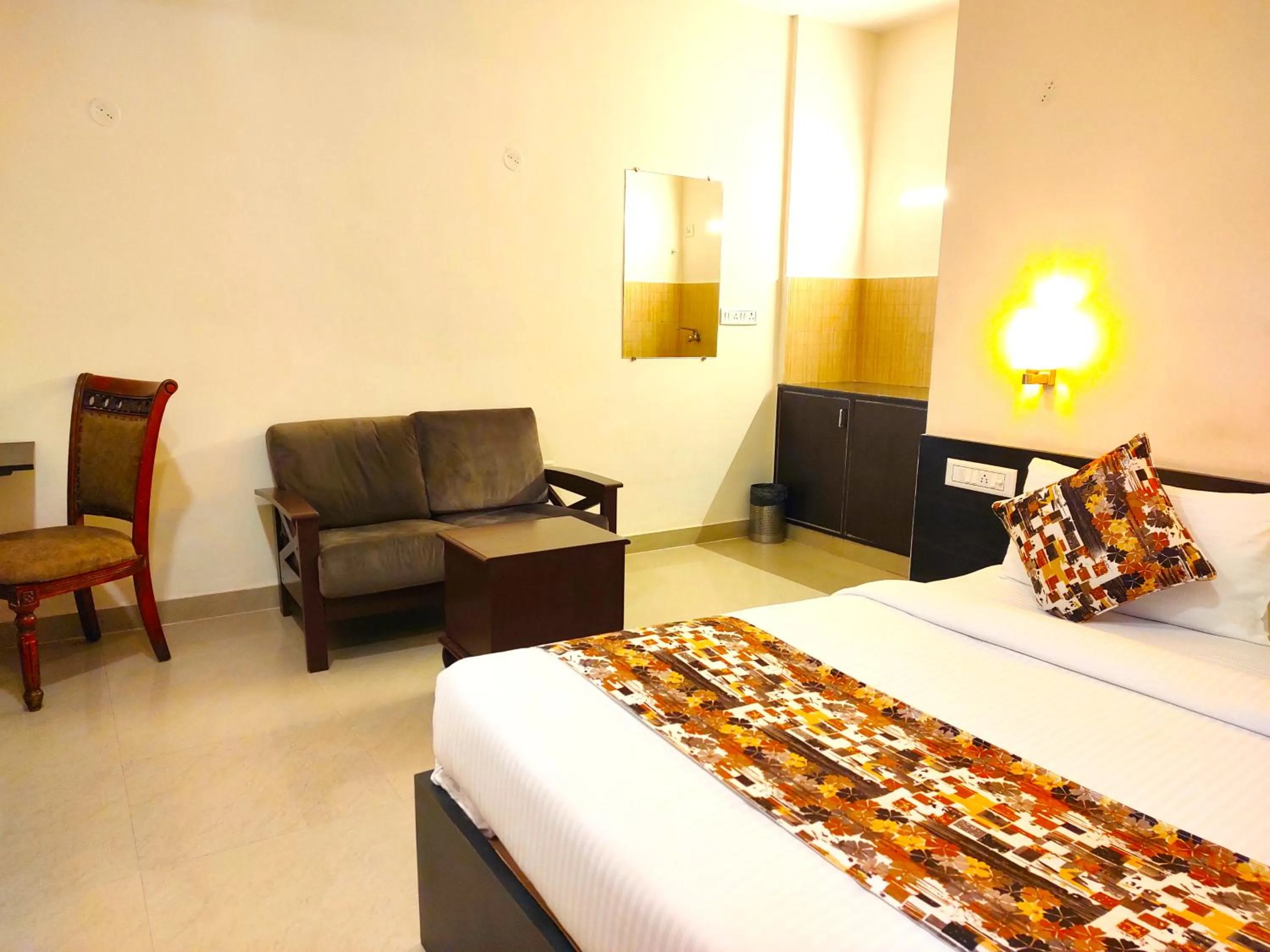 Bed in Athasri Hotel HSR Layout