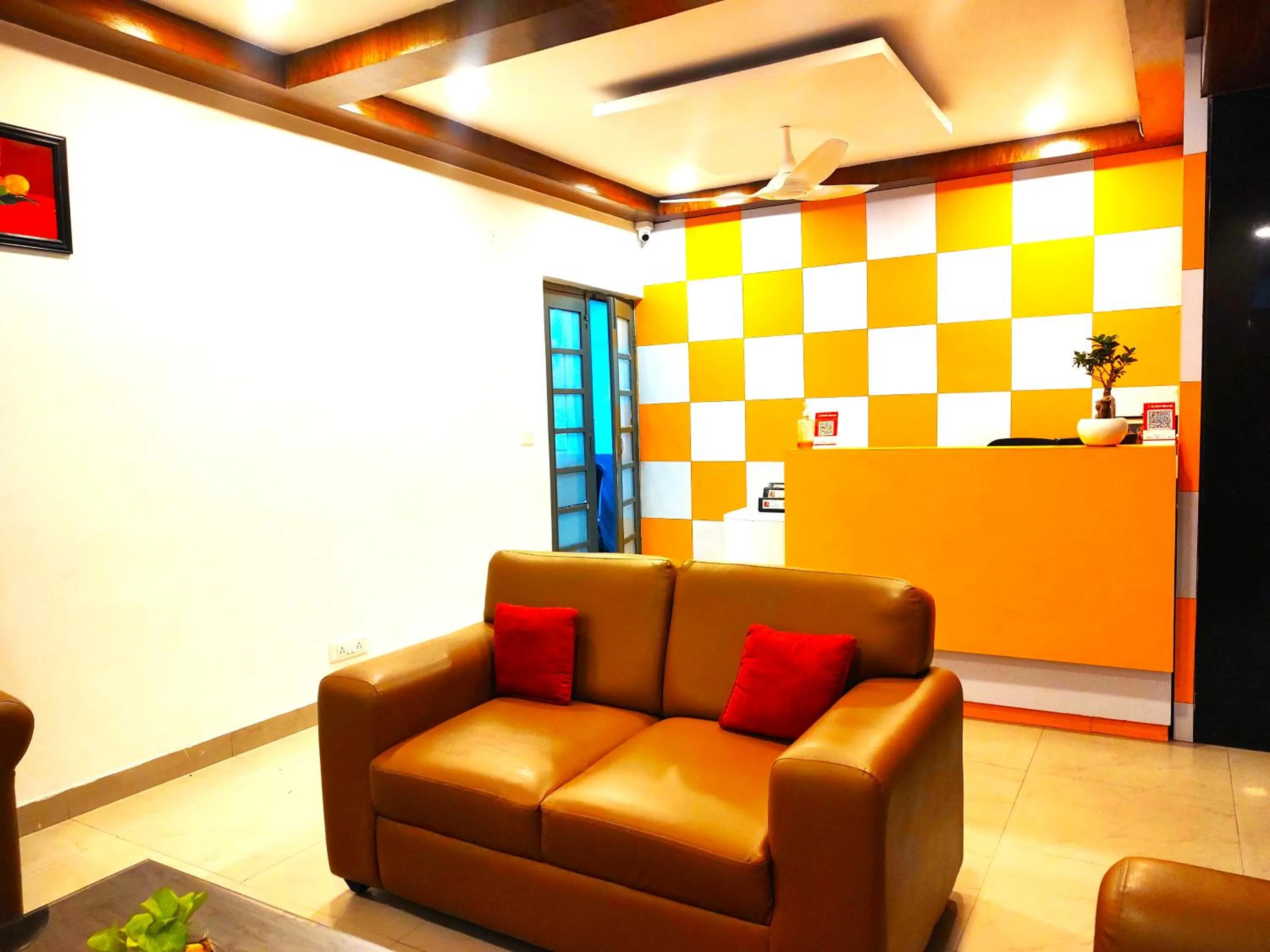 Living room in Athasri Hotel HSR Layout