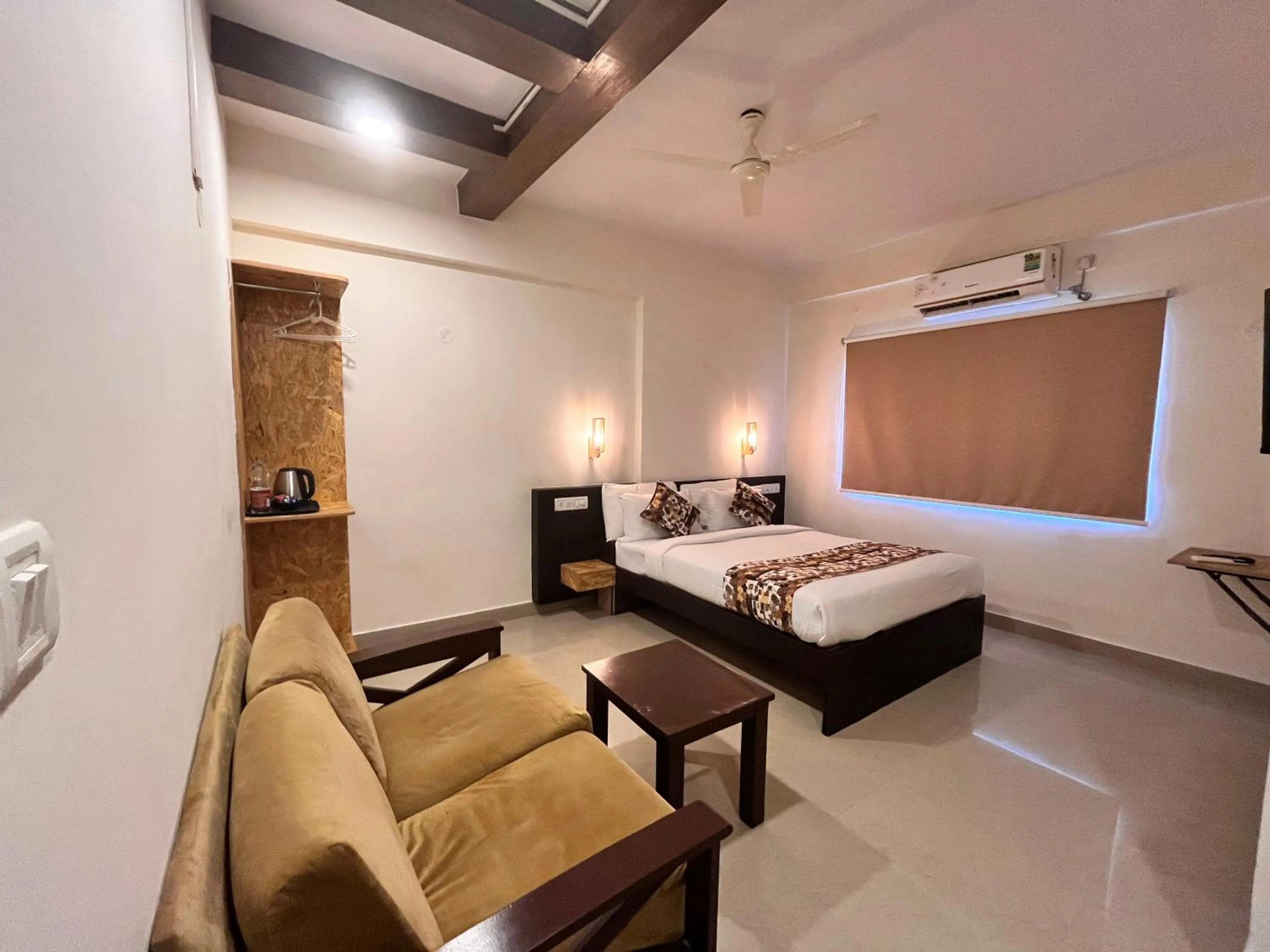 Bed in Athasri Hotel HSR Layout