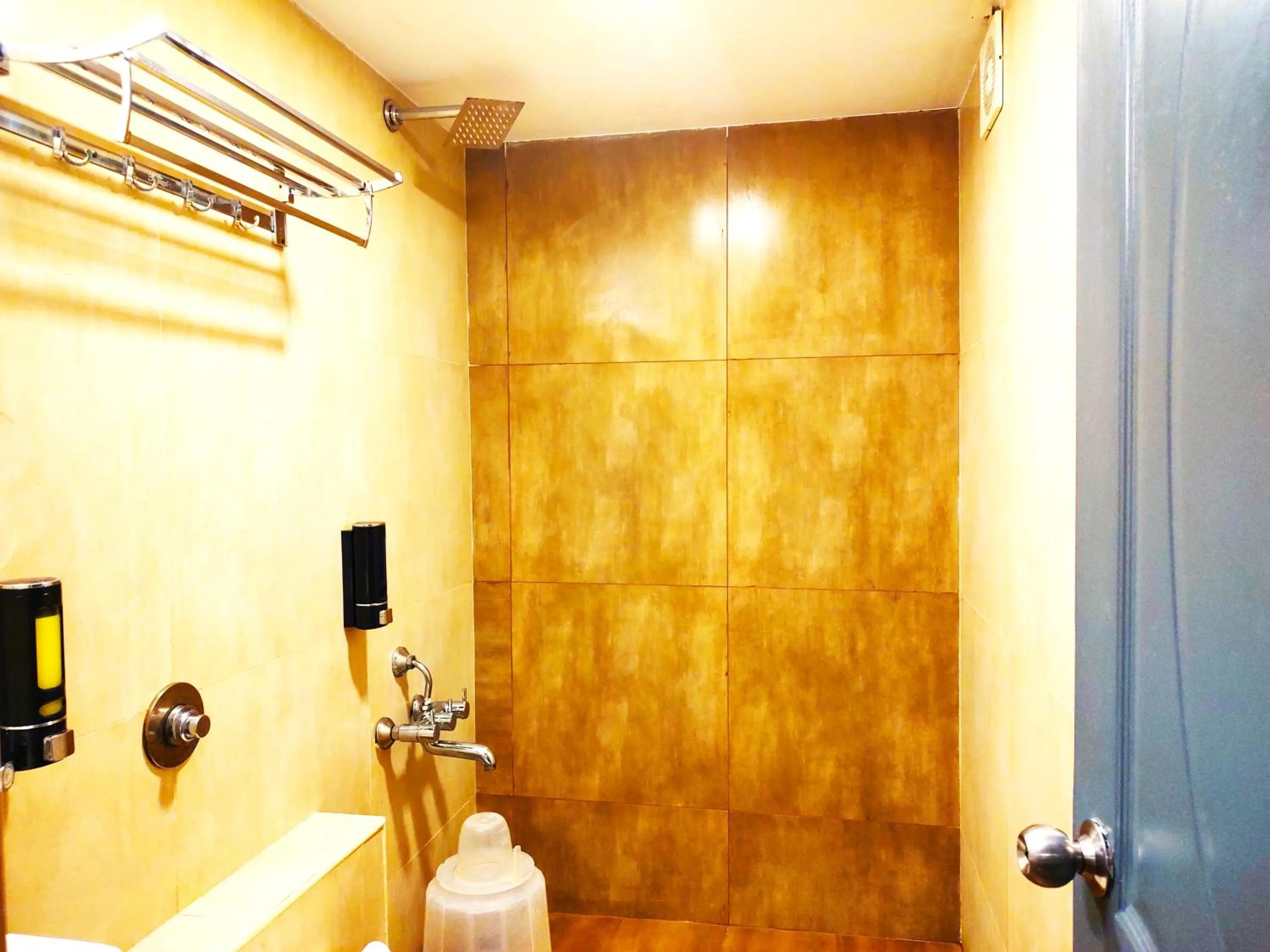 Shower in Athasri Hotel HSR Layout