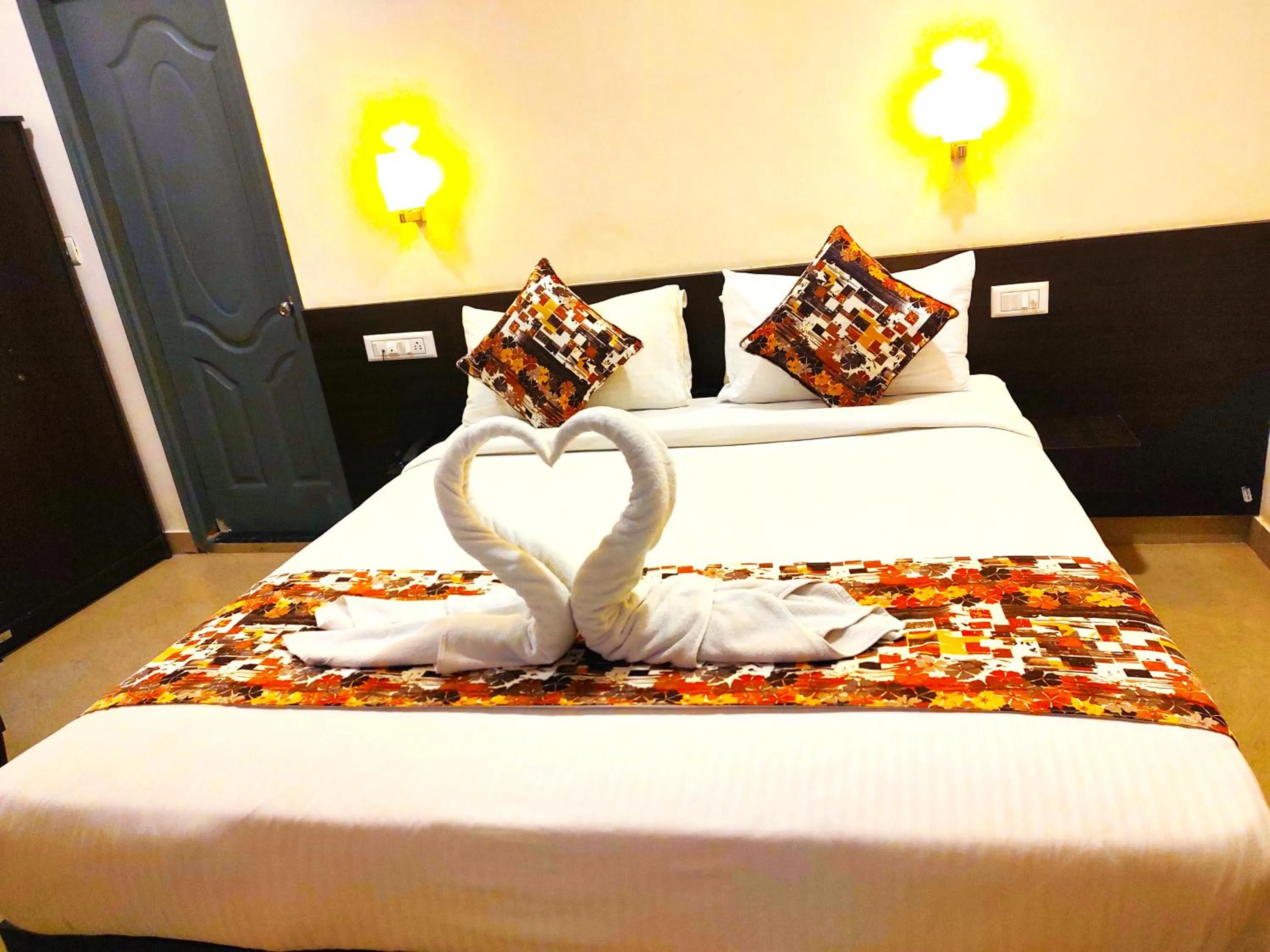 Bed in Athasri Hotel HSR Layout