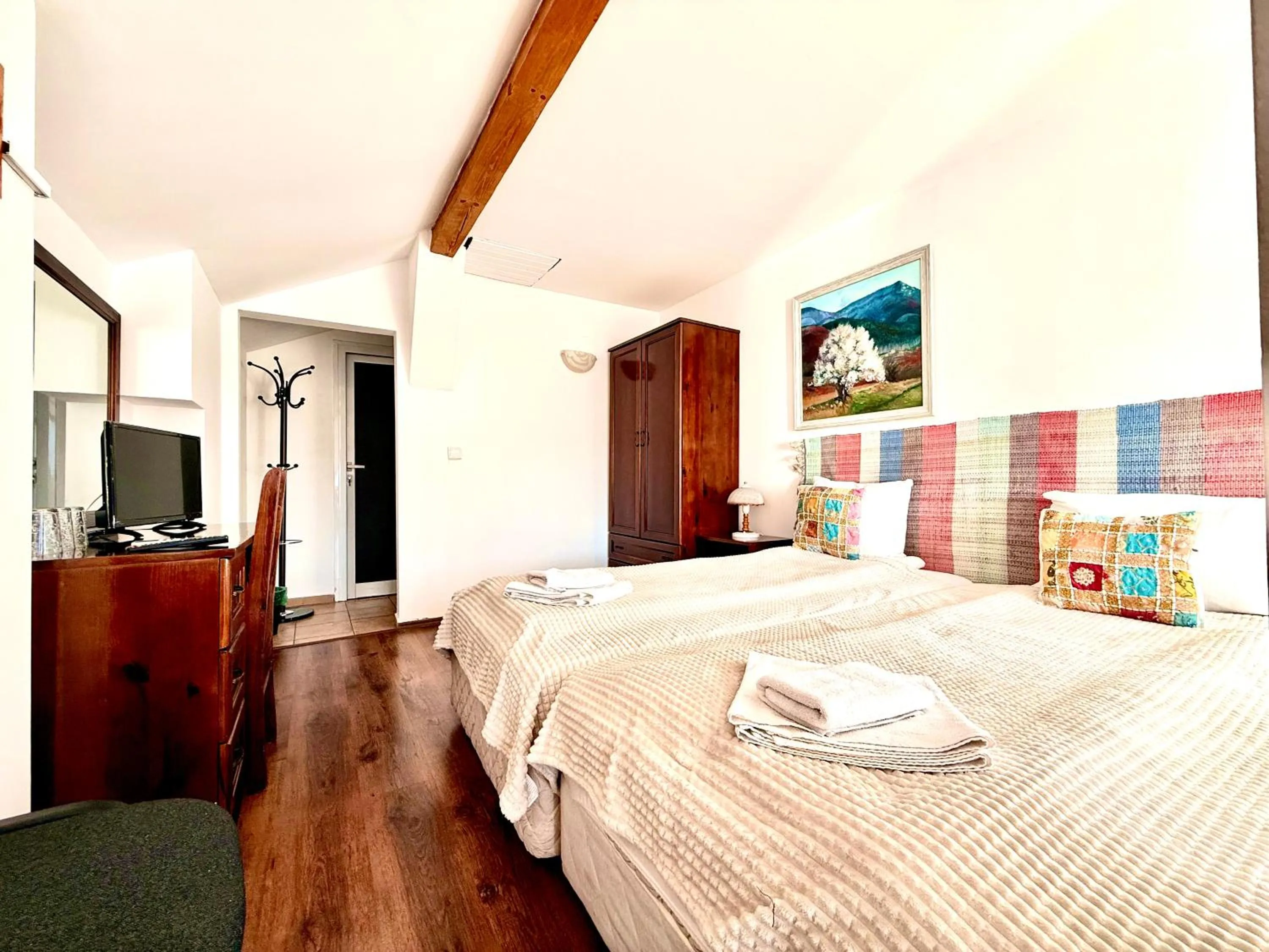 Bed in Family Hotel Carpe Diem