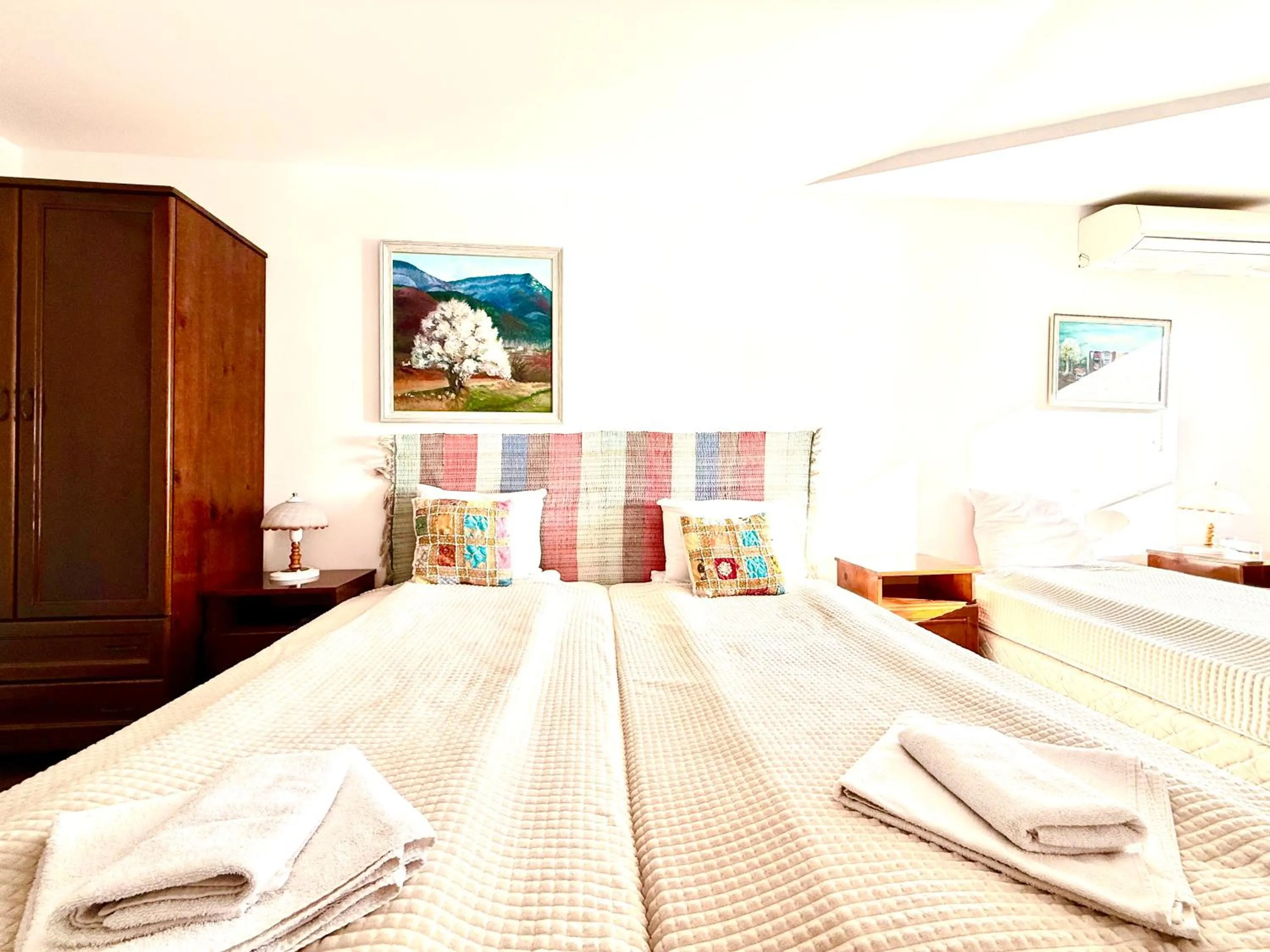 Bed in Family Hotel Carpe Diem