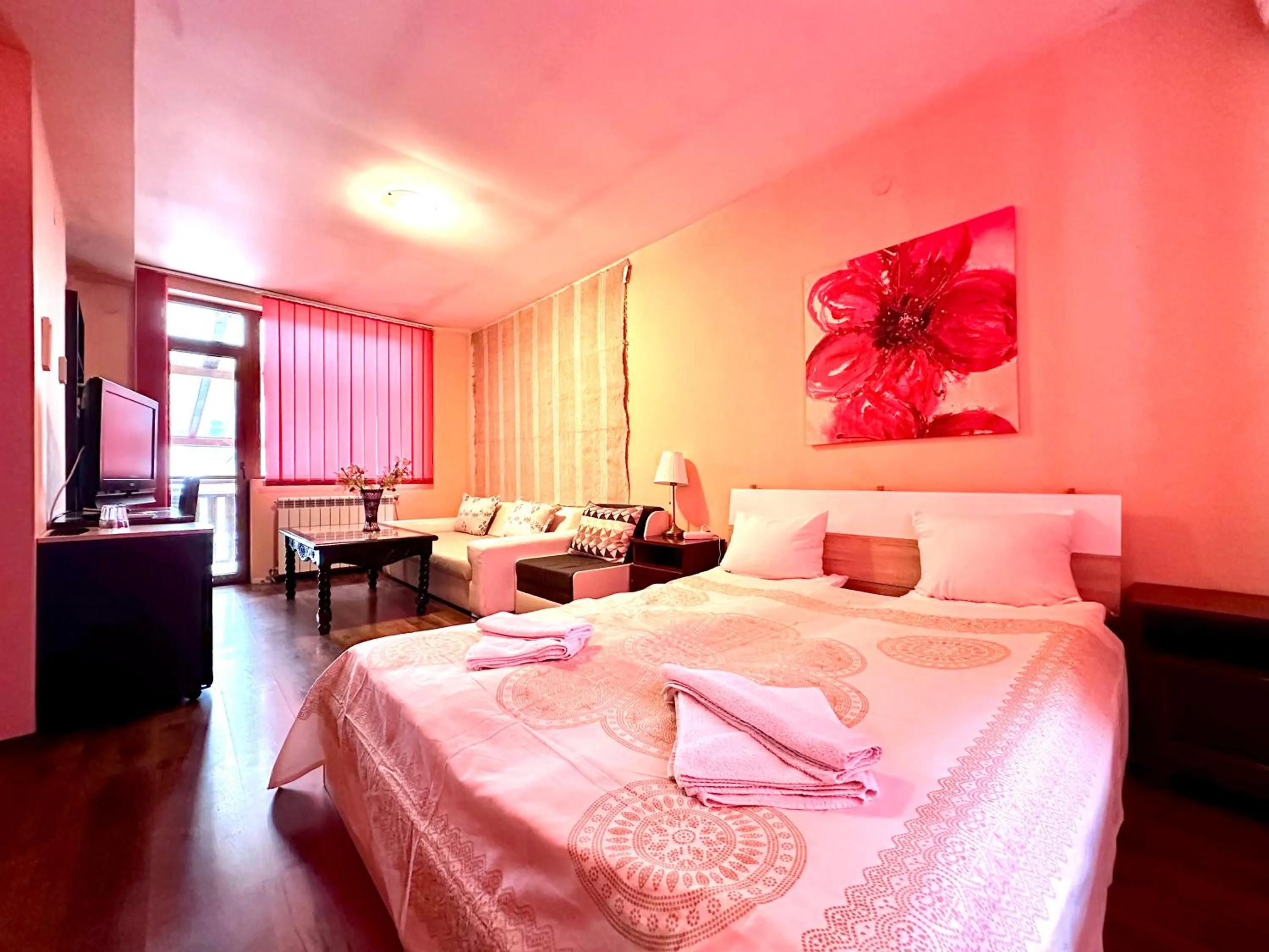 Bed in Family Hotel Carpe Diem