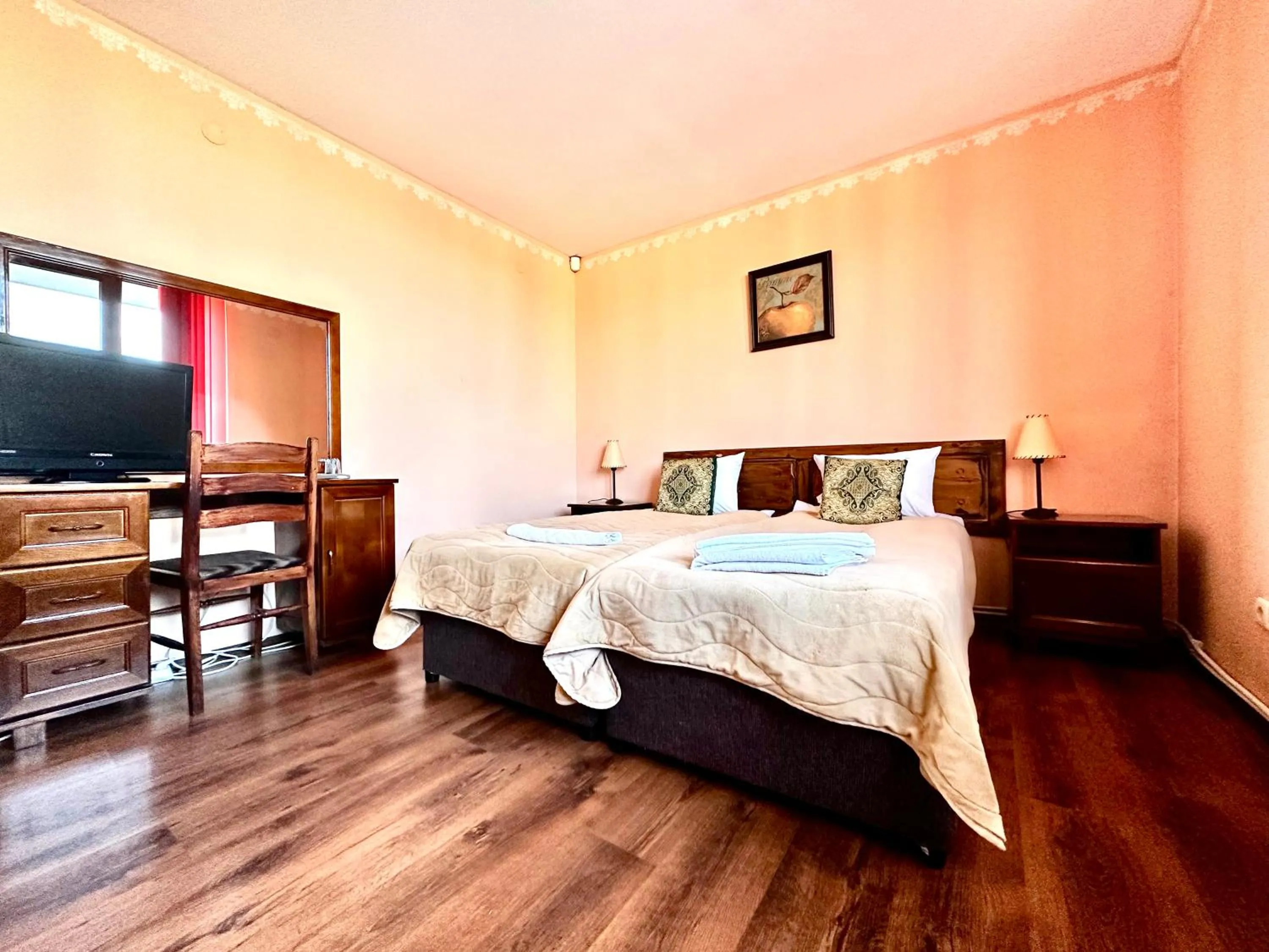 Bed in Family Hotel Carpe Diem