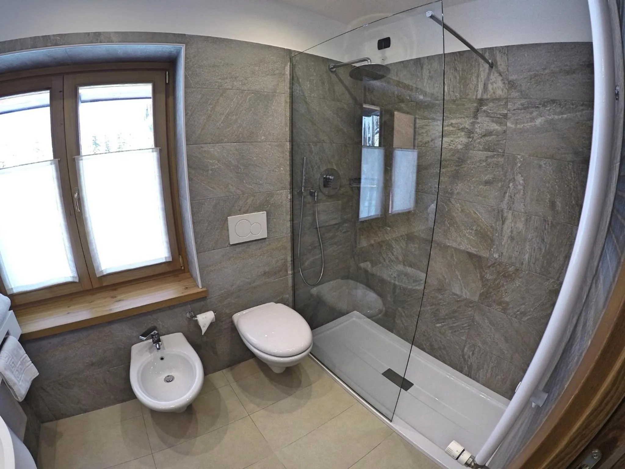 Bathroom in Chalet Alpina Hotel & Apartments