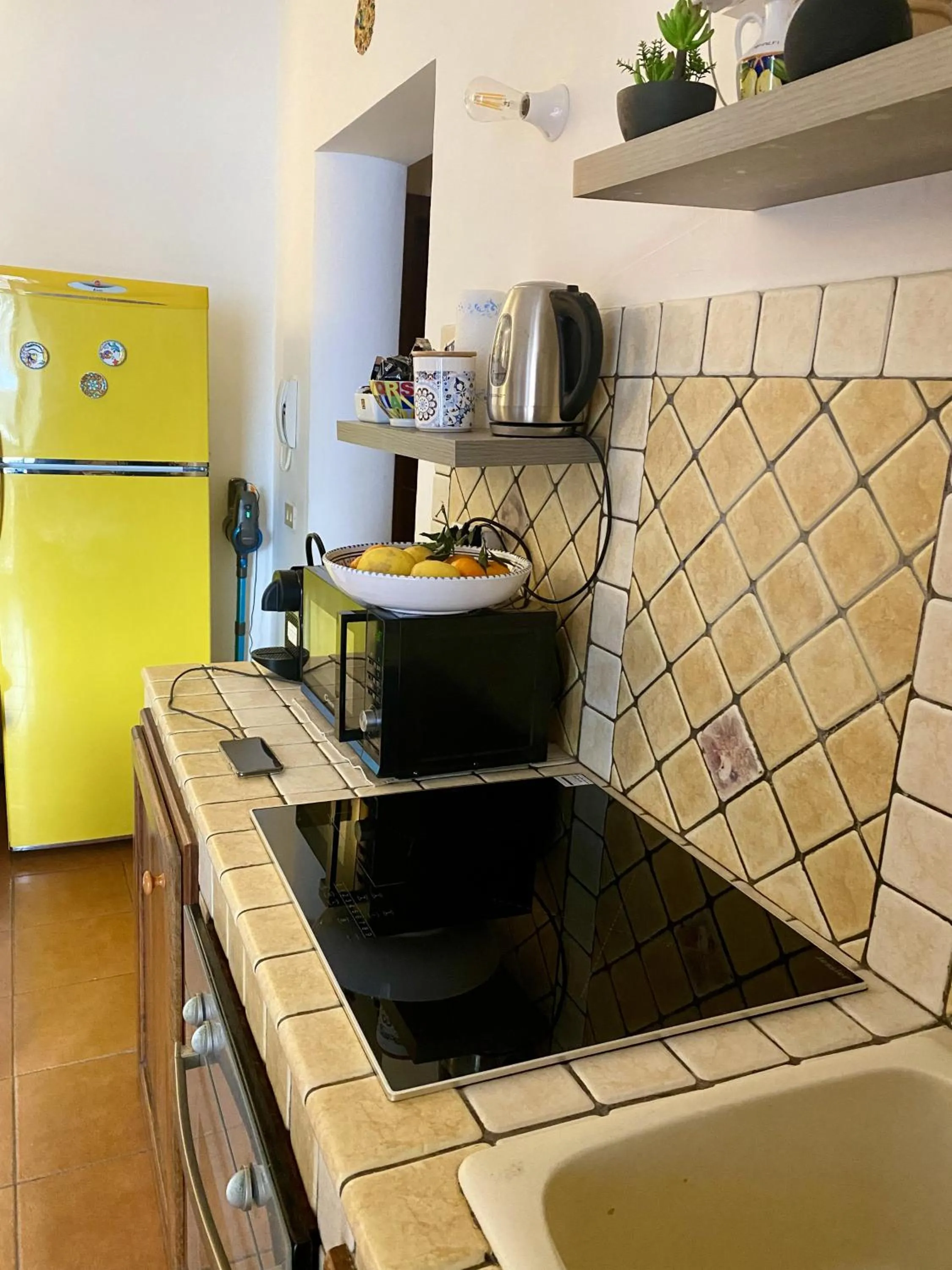 Kitchen or kitchenette in Casa Emma